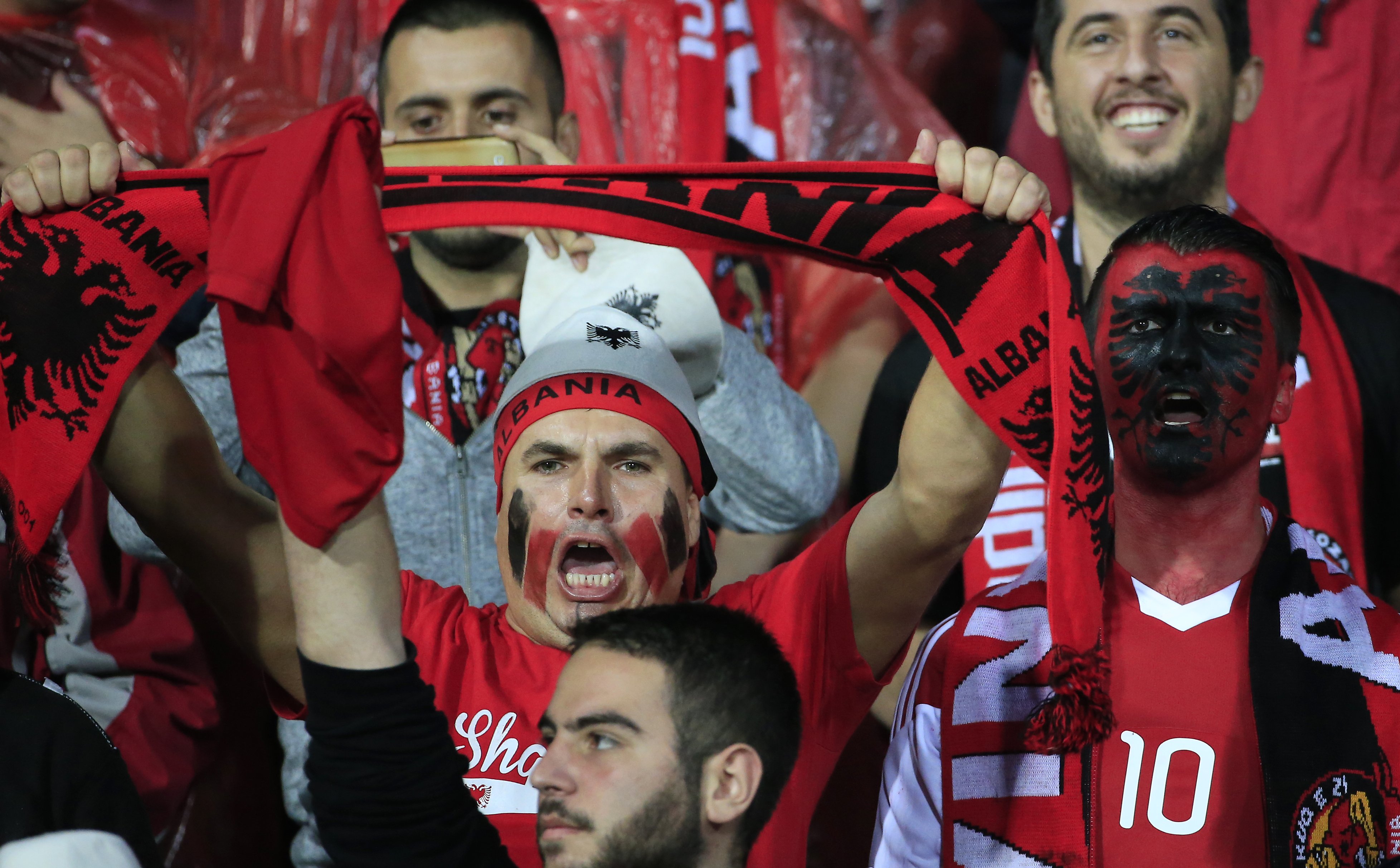 ELBASAN, OCTOBER - OCTOBER 08: Albania's fans cheer their team before the Euro 2016 qualifying football match between Albania and Serbia at the Elbasan Arena in Elbasan on October 08, 2015.  (Photo by Srdjan Stevanovic/Getty Images)