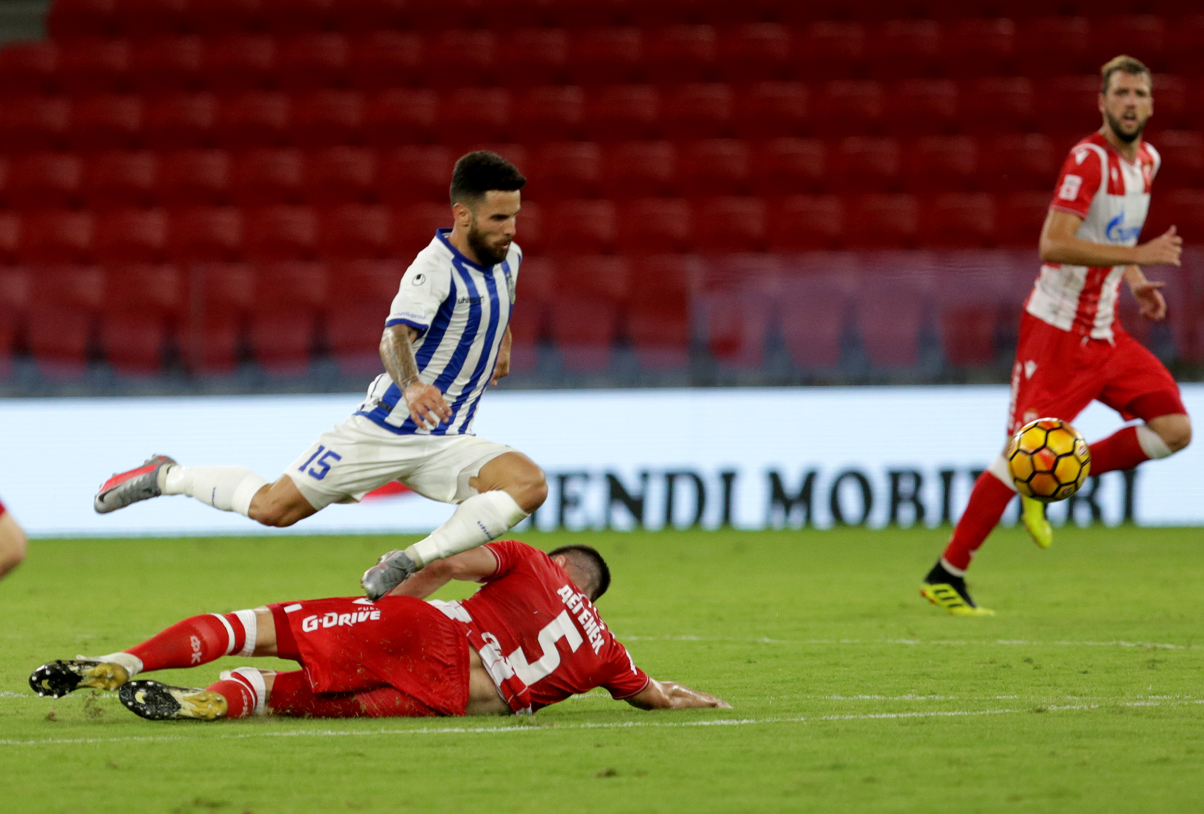epa08625455 Fc Tirana player Agustin Torassa (1-C) in action with Red Star of Belgrade player Milos Degenek (2-C) during the UEFA Champions League second round of qualification match in Tirana, Albania, 25 August 2020.  EPA-EFE/Malton Dibra