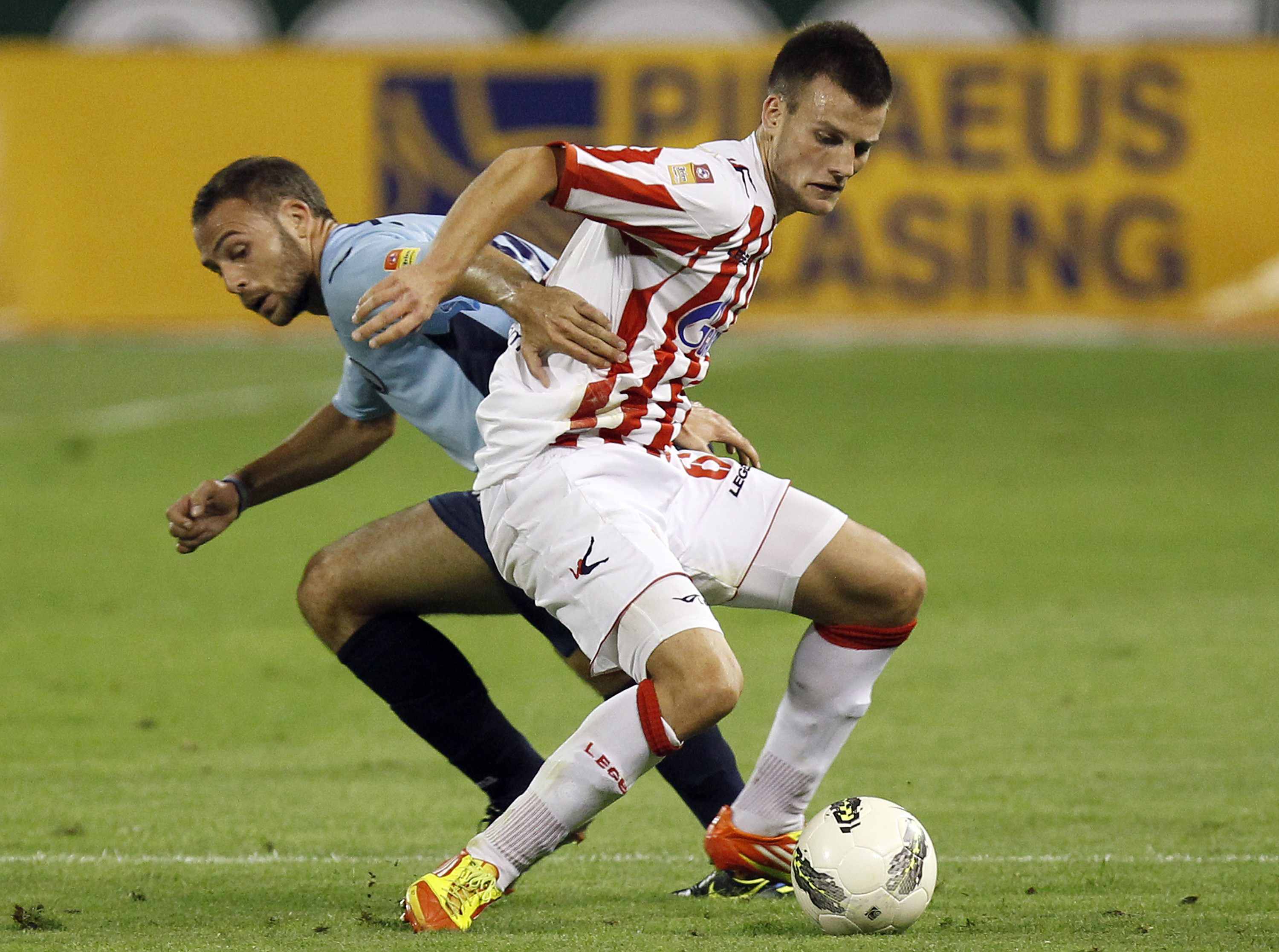Fudbal, Jelen super liga, season 2012/2013.Rad Vs. Partizan.Jovan Krneta right and Slavko Perovic.Beograd, 19.08.2012..Srdjan Stevanovic/Starsportphoto ©