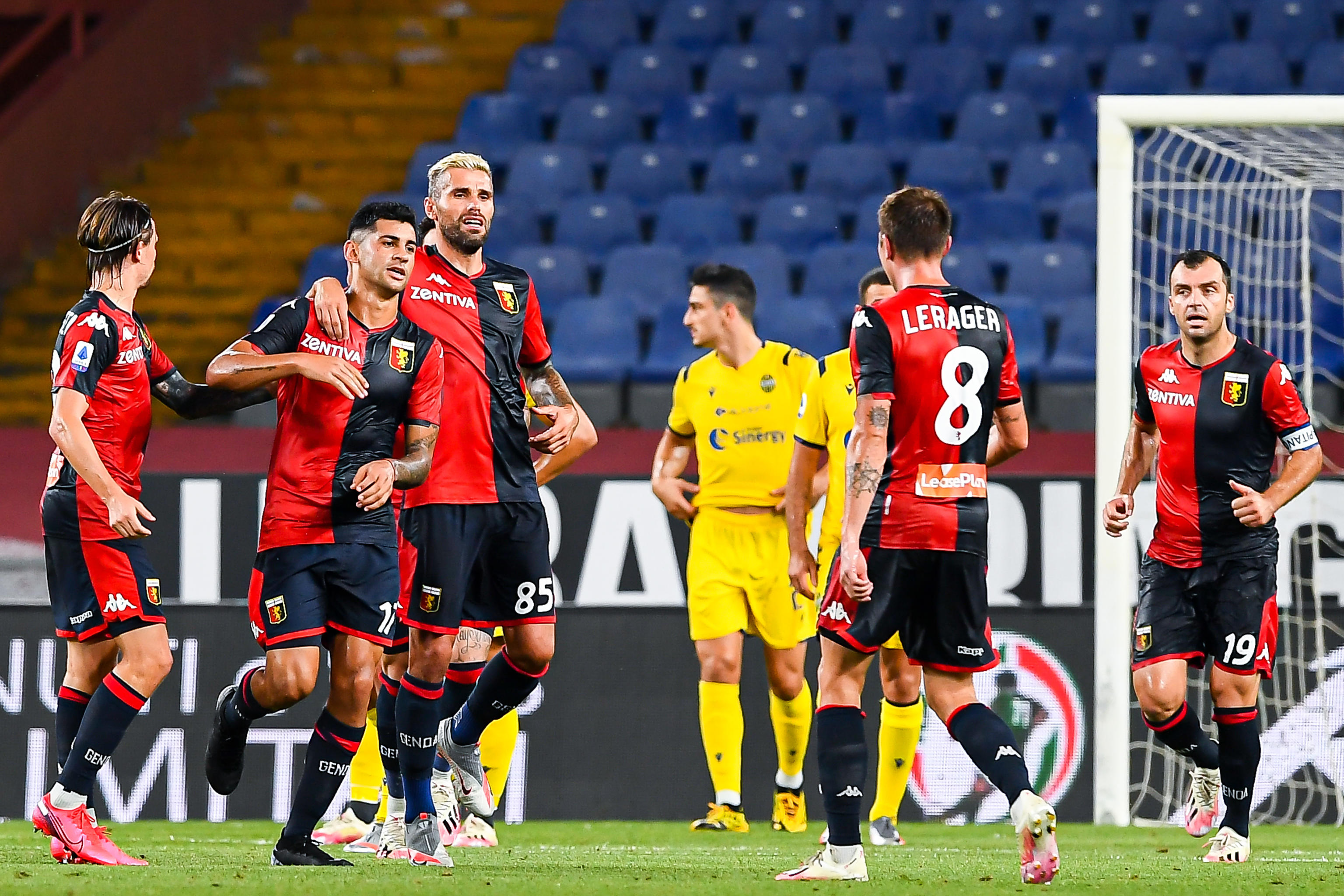 epa08581040 Genoa?s Cristian Romero (2-L) celebrates with teammates after scoring during the Italian Serie A soccer match Genoa CFC vs Hellas Verona FC at Luigi Ferraris stadium in Genoa, Italy, 02 August 2020.  EPA-EFE/SIMONE ARVEDA