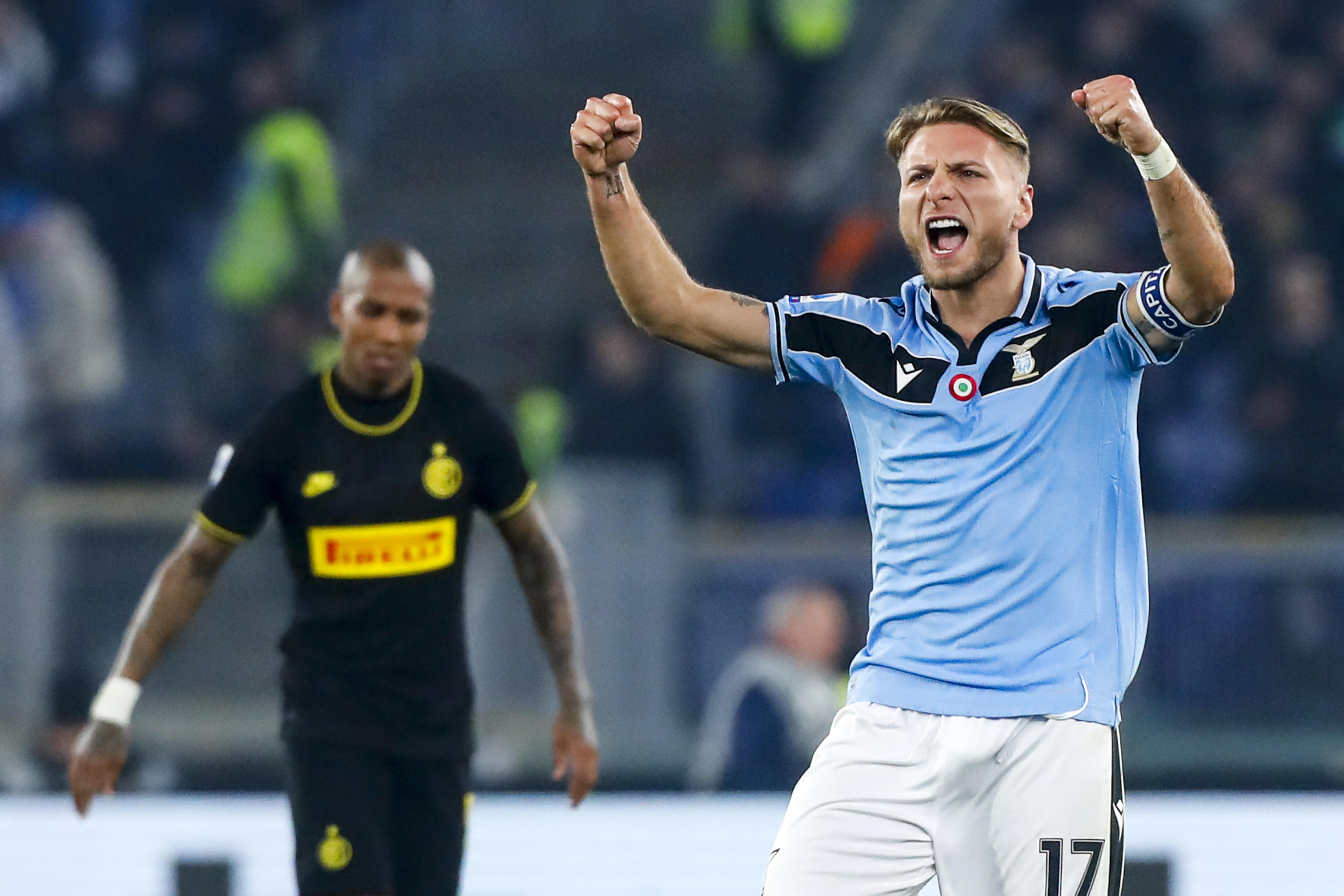 epa08222944 Lazio's Ciro Immobile celebrates after scoring the 1-1 goal during the Italian Serie A soccer match SS Lazio vs FC Inter at Olimpico stadium in Rome, Italy, 16 February 2020.  EPA-EFE/ANGELO CARCONI