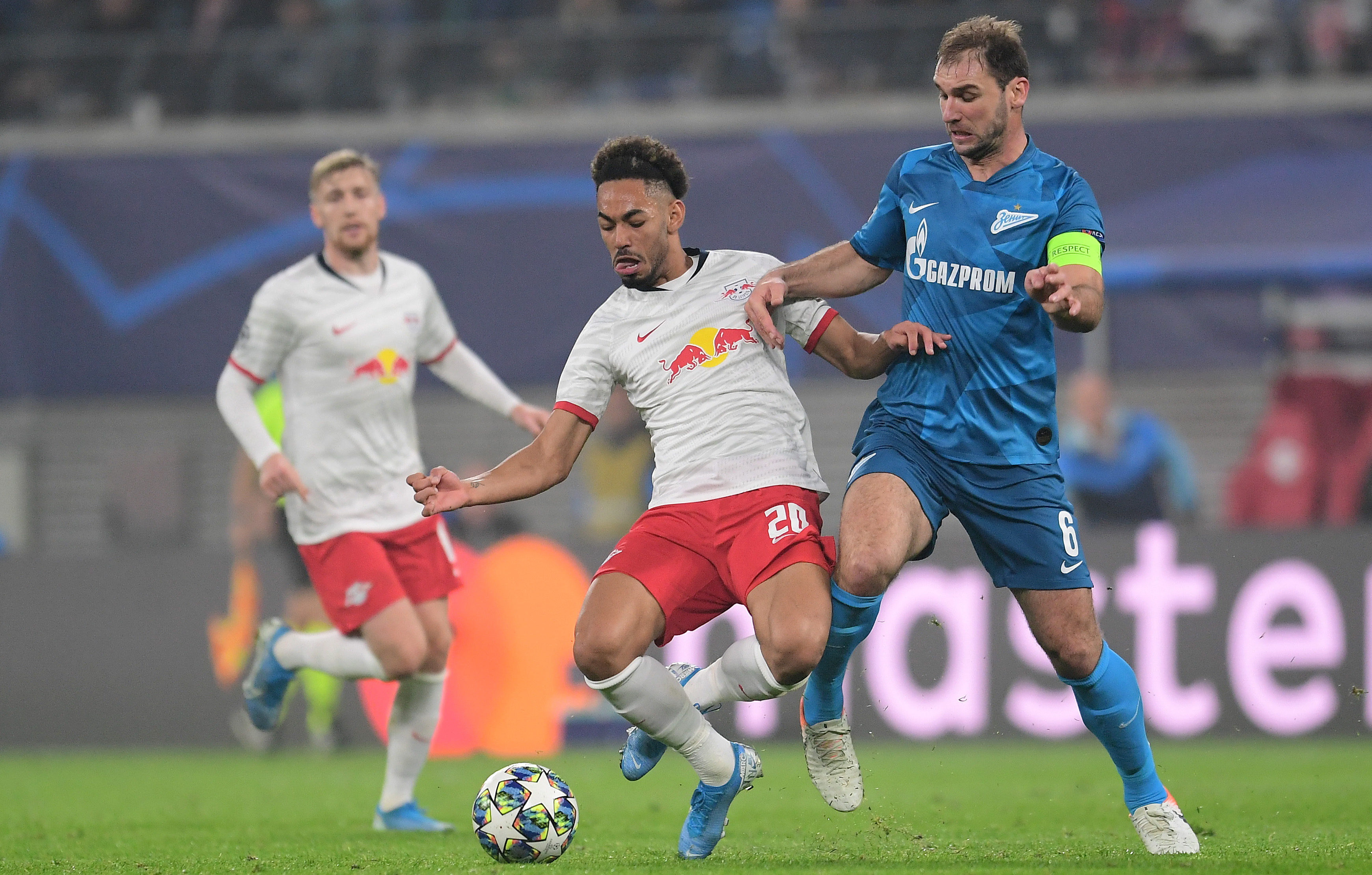 epa07943908 Leipzig's Matheus Cunha (L) in action with Zenit's Branislav Ivanovic (R) during the UEFA Champions League match between RB Leipzig vs Zenit St.Petersburg in Leipzig, Germany 23 October 2019.  EPA-EFE/FILIP SINGER