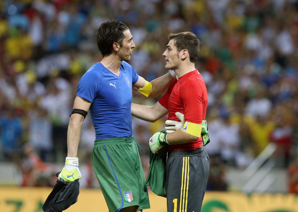 epa03763892 Gianluigi Buffon (L) Goalkeeper of Italy and Iker Casillas (R) Goalkeeper of Spain are seen after their Confederations Cup semi final match between Spain and Italy at the Castelao stadium in Fortaleza, Brazil, 27 June 2013.  EPA/SRDJAN SUKI
