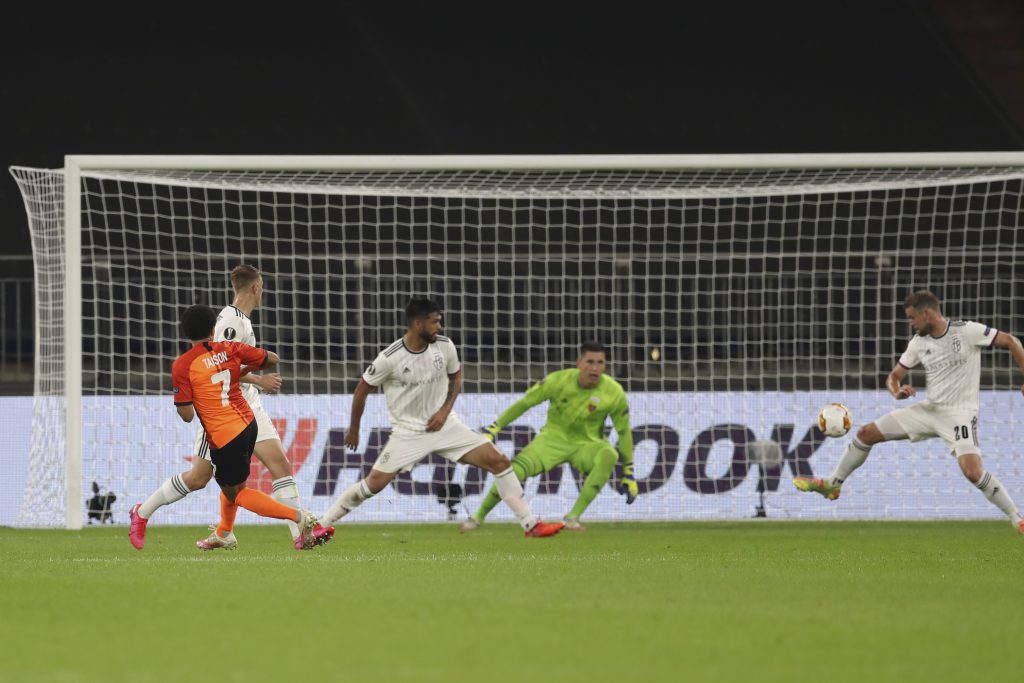 epa08597942 Taison of Shakhtar (L) scores the 2-0 goal during the UEFA Europa League quarter final match between Shakhtar Donetsk and FC Basel in Gelsenkirchen, Germany, 11 August 2020.  EPA-EFE/Lars Baron / POOL