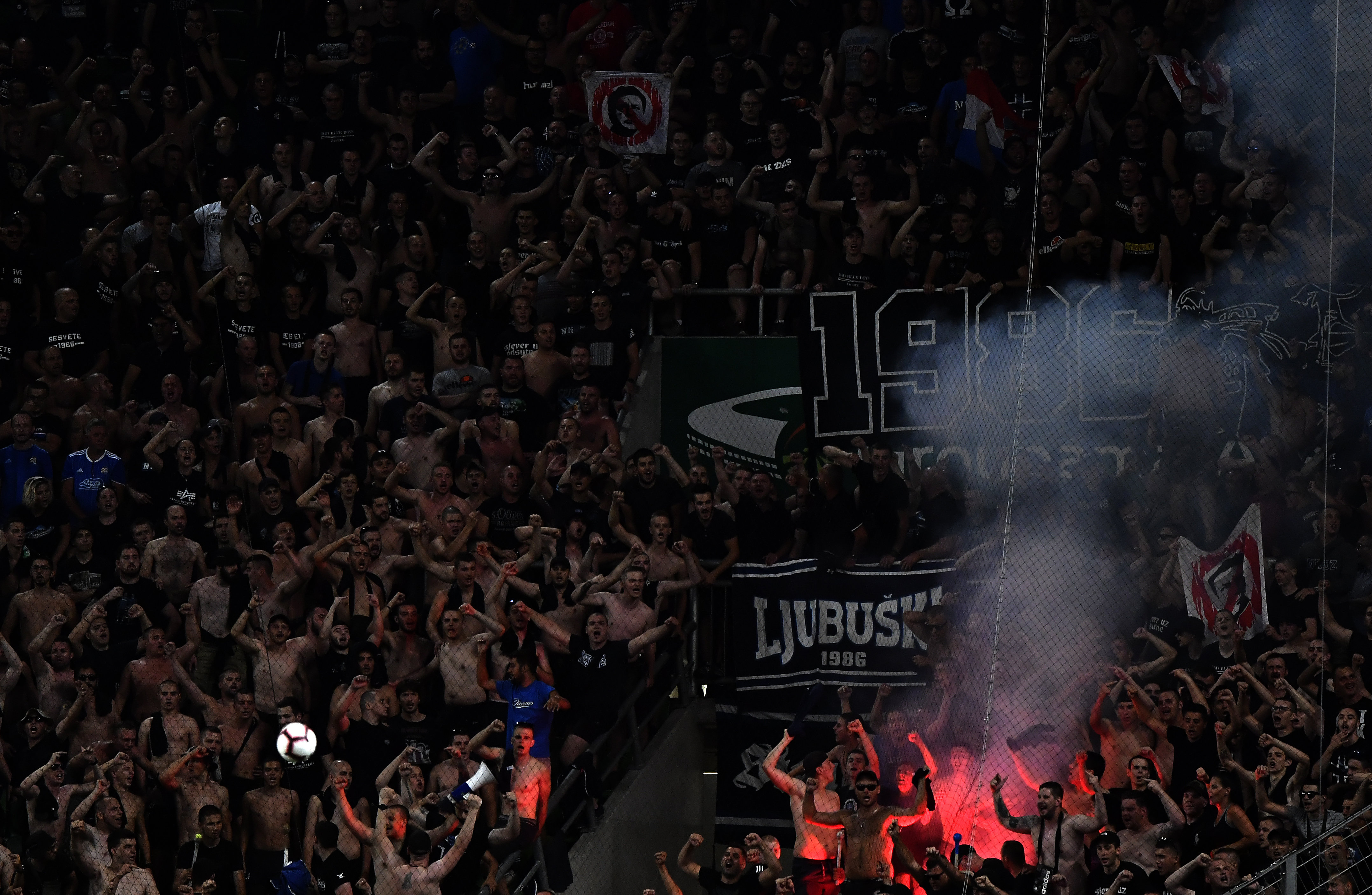 epa07771928 Fans of Dinamo Zagreb cheer during the soccer Champions League third qualifying round first leg soccer match Ferencvaros vs Dinamo Zagreb in Budapest, Hungary, 13 August 2019.  EPA-EFE/Tibor Illyes HUNGARY OUT