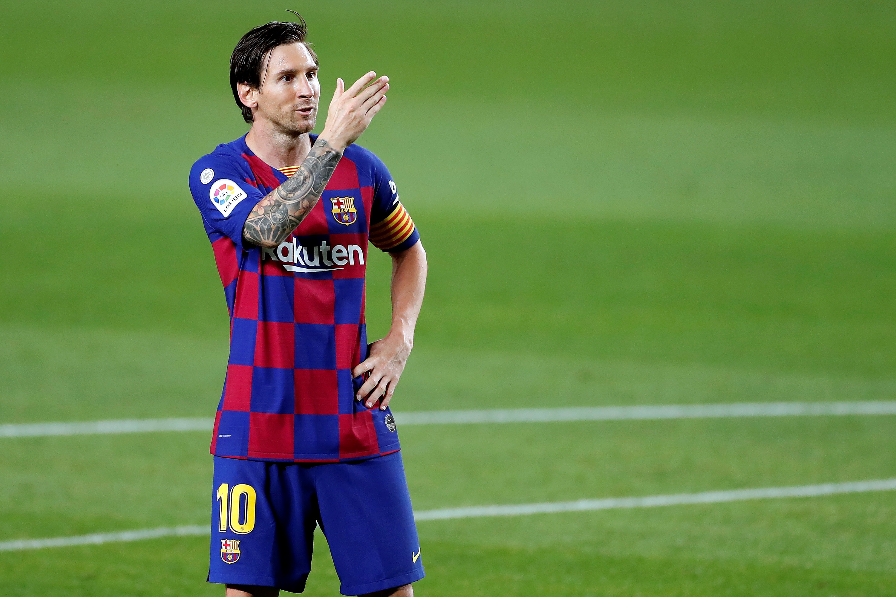 epa08489455 FC Barcelona's Lionel Messi celebrates after scoring the 2-0 goal during the Spanish LaLiga soccer match between FC Barcelona and CD Leganes at Camp Nou stadium in Barcelona, Spain, 16 June 2020.  EPA-EFE/ALBERTO ESTEVEZ