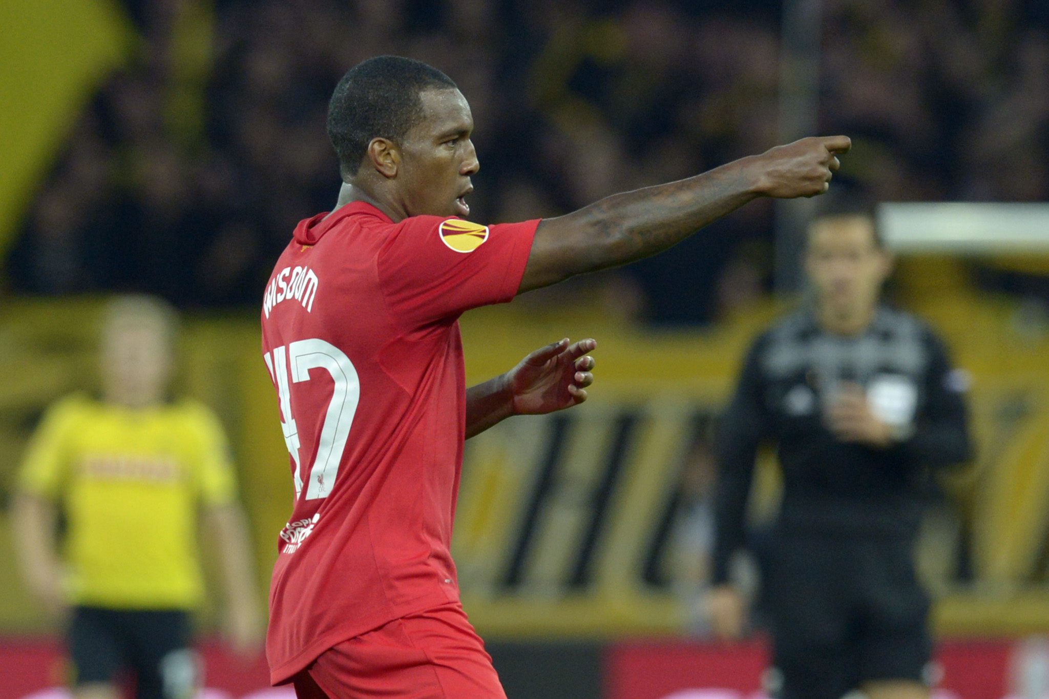 epa03404325 Liverpool's Andre Wisdom celebrates his goal to 1:2 during the UEFA Europa League Group A soccer match between BSC Young Boys Bern and Liverpool FC at the Stade de Suisse in Bern, Switzerland, 20 September 2012.  EPA/ALESSANDRO DELLA VALLE