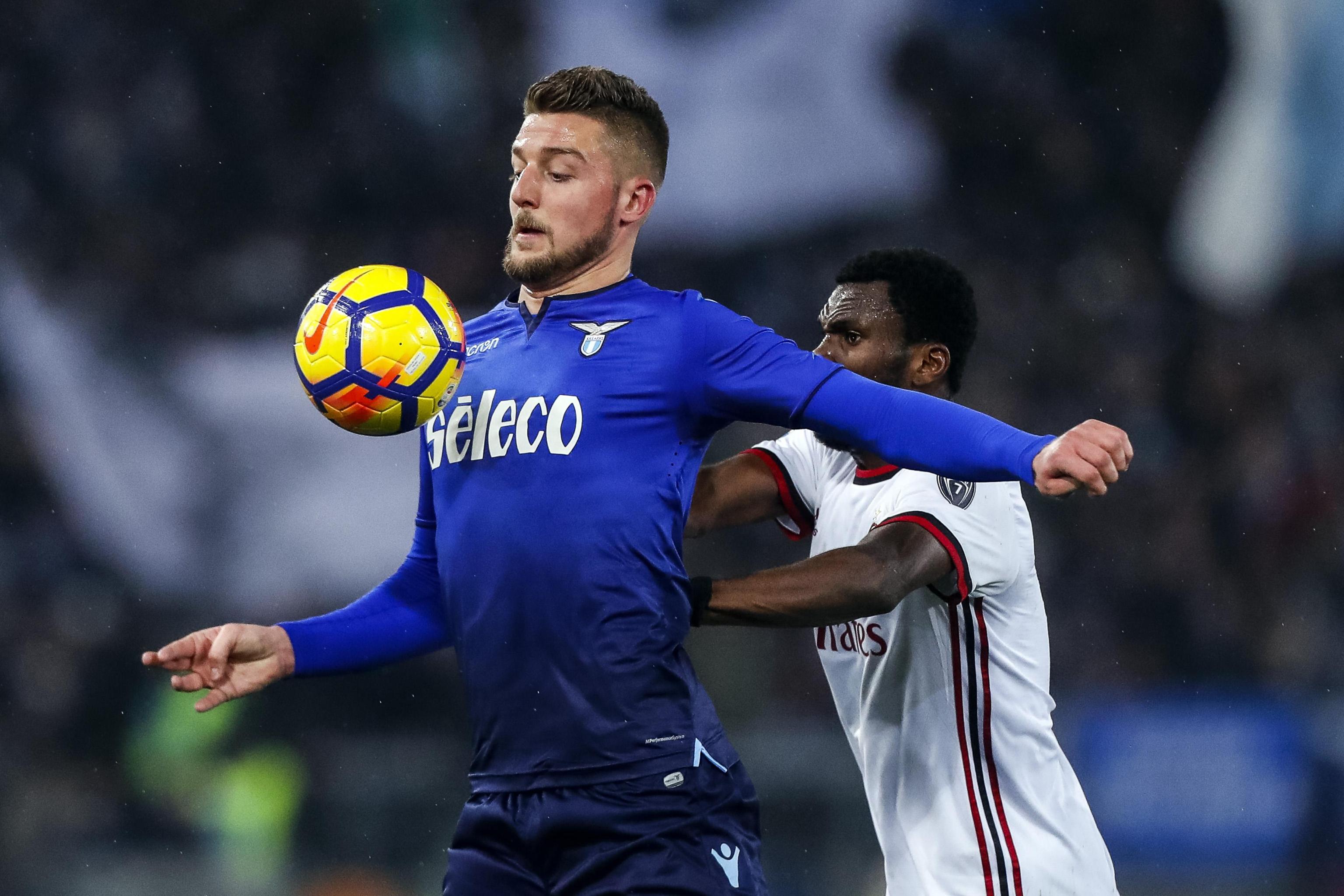 epa06571426 Lazio's Sergej Milinkovic-Savic (L) and Milan's Franck Kessie in action during the Italian Cup second leg semifinal soccer match between SS Lazio and AC Milan at the Olimpico stadium in Rome, Italy, 28 February 2018.  EPA-EFE/ANGELO CARCONI
