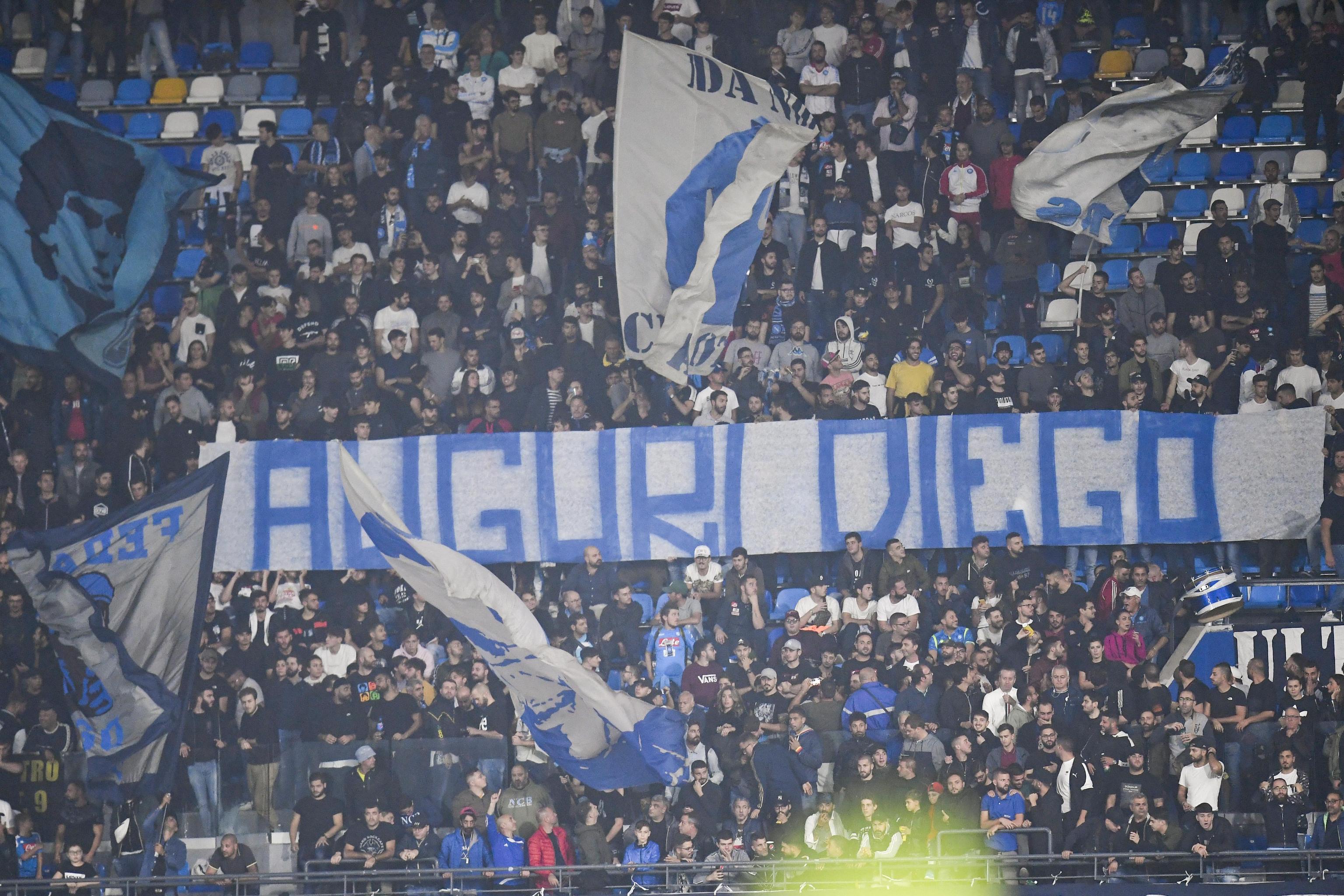 epa07960585 A banner exposed in the stadium for Napoli's former player Diego Armando Maradona during the Italian Serie A soccer match between SSC Napoli and Atalanta BC at the San Paolo stadium in Naples, Italy, 30 October 2019.  EPA-EFE/CIRO FUSCO