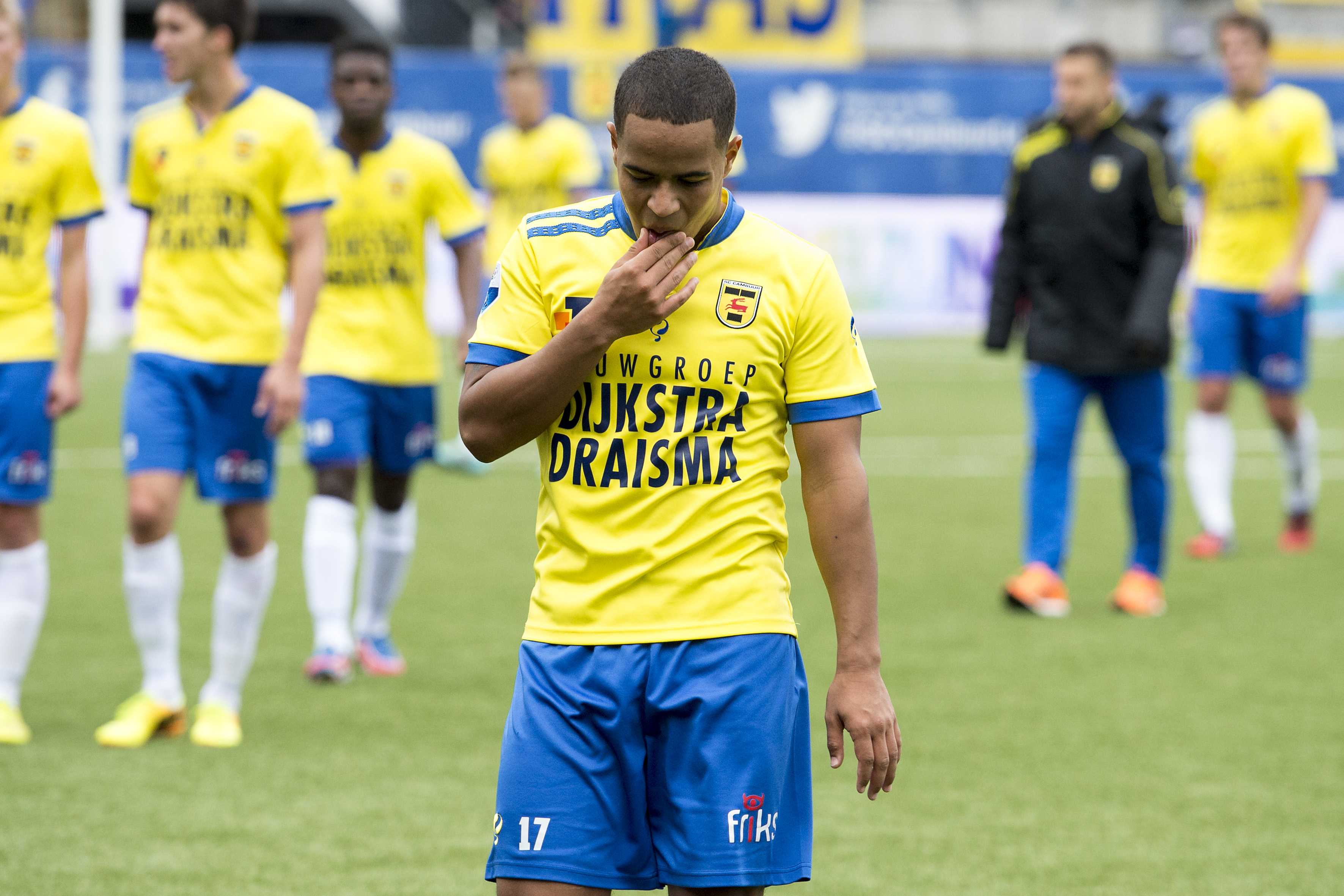 epa04464593 Cambuur Leeuwarden player Lucas Bijker reacts after the Dutch Eredivisie soccer match between Cambuur Leeuwarden and Feyenoord Rotterdam in Leeuwarden, The Netherlands, 26 October 2014. Leeuwarden lost the match 0-1.  EPA/JASPER RUHE