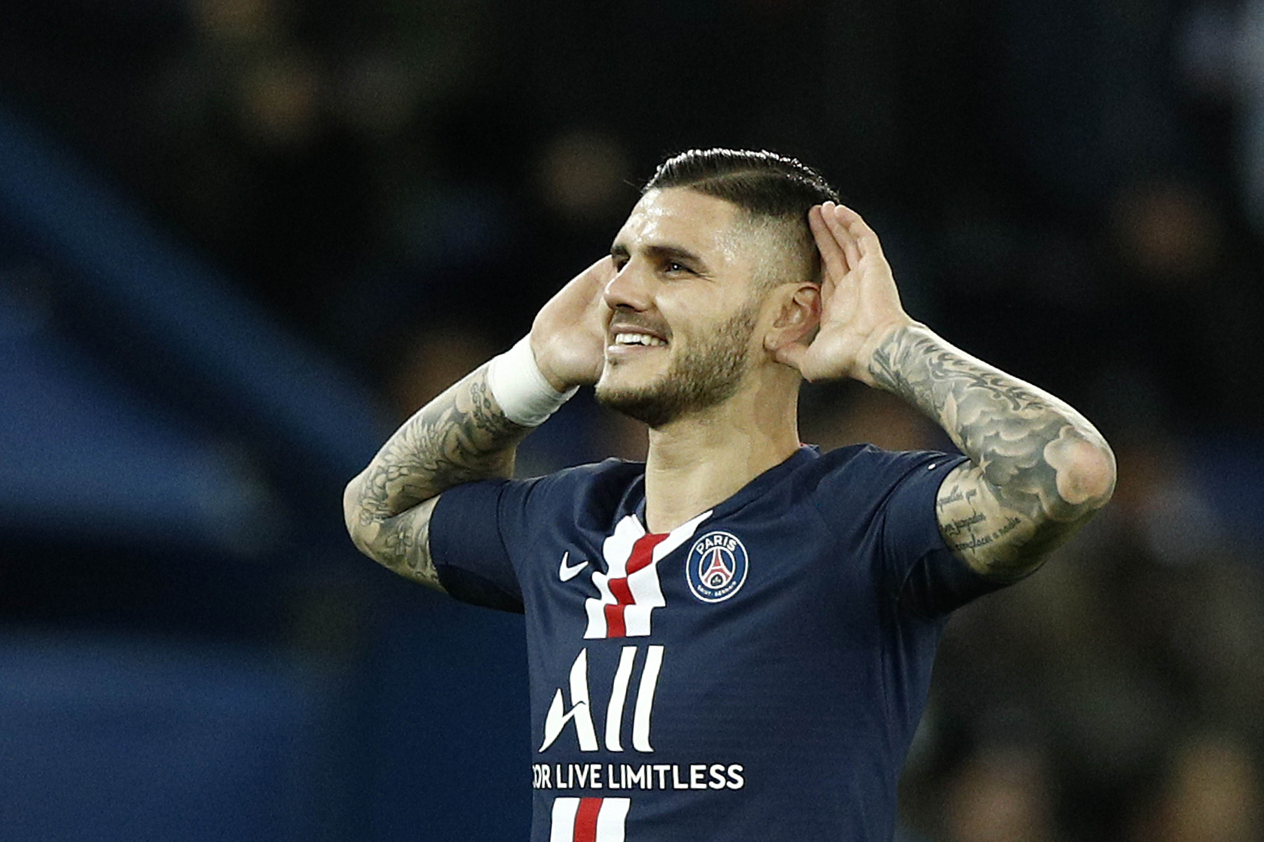 epa08017886 Paris Saint Germain's Mauro Icardi reacts after scoring the 1-0 lead during the French Ligue 1 soccer match between PSG and Lille at the Parc des Princes stadium in Paris, France, 22 November 2019.  EPA-EFE/YOAN VALAT