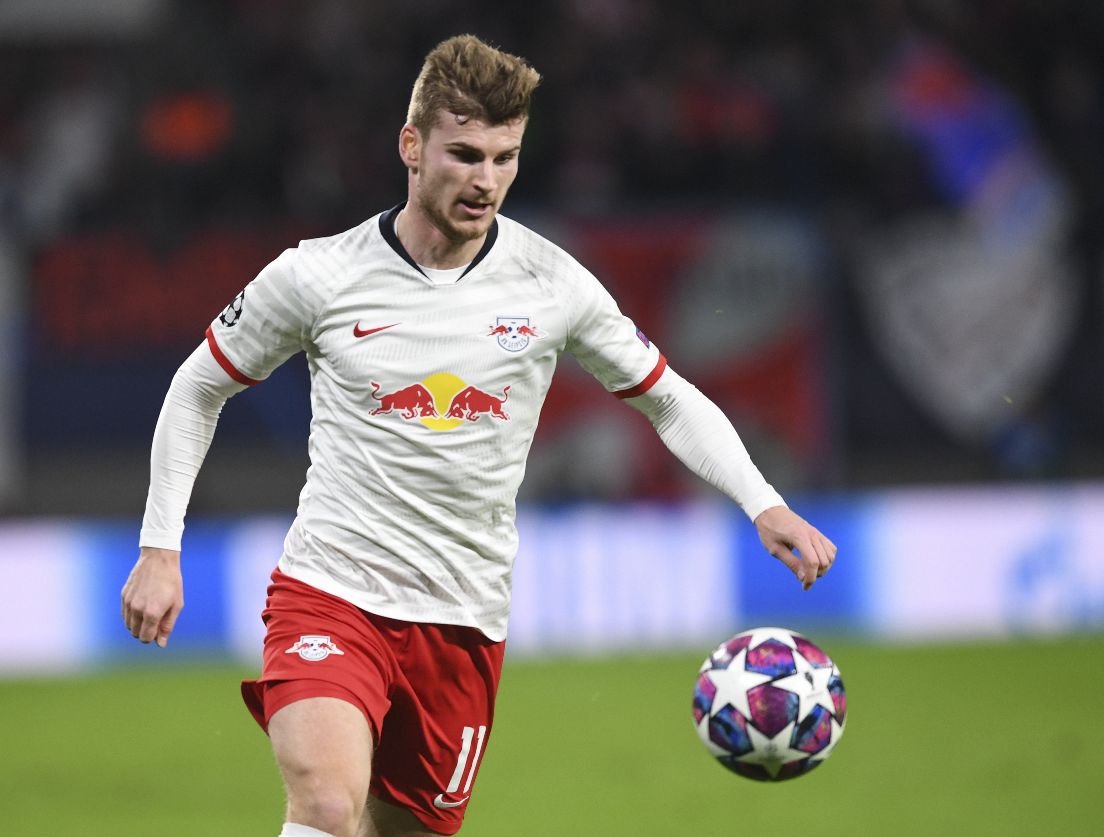 epa08284504 Leipzig's Timo Werner in action during the UEFA Champions League round of 16, second leg soccer match between RB Leipzig and Tottenham Hotspur in Leipzig, Germany, 10 March 2020.  EPA-EFE/FILIP SINGER