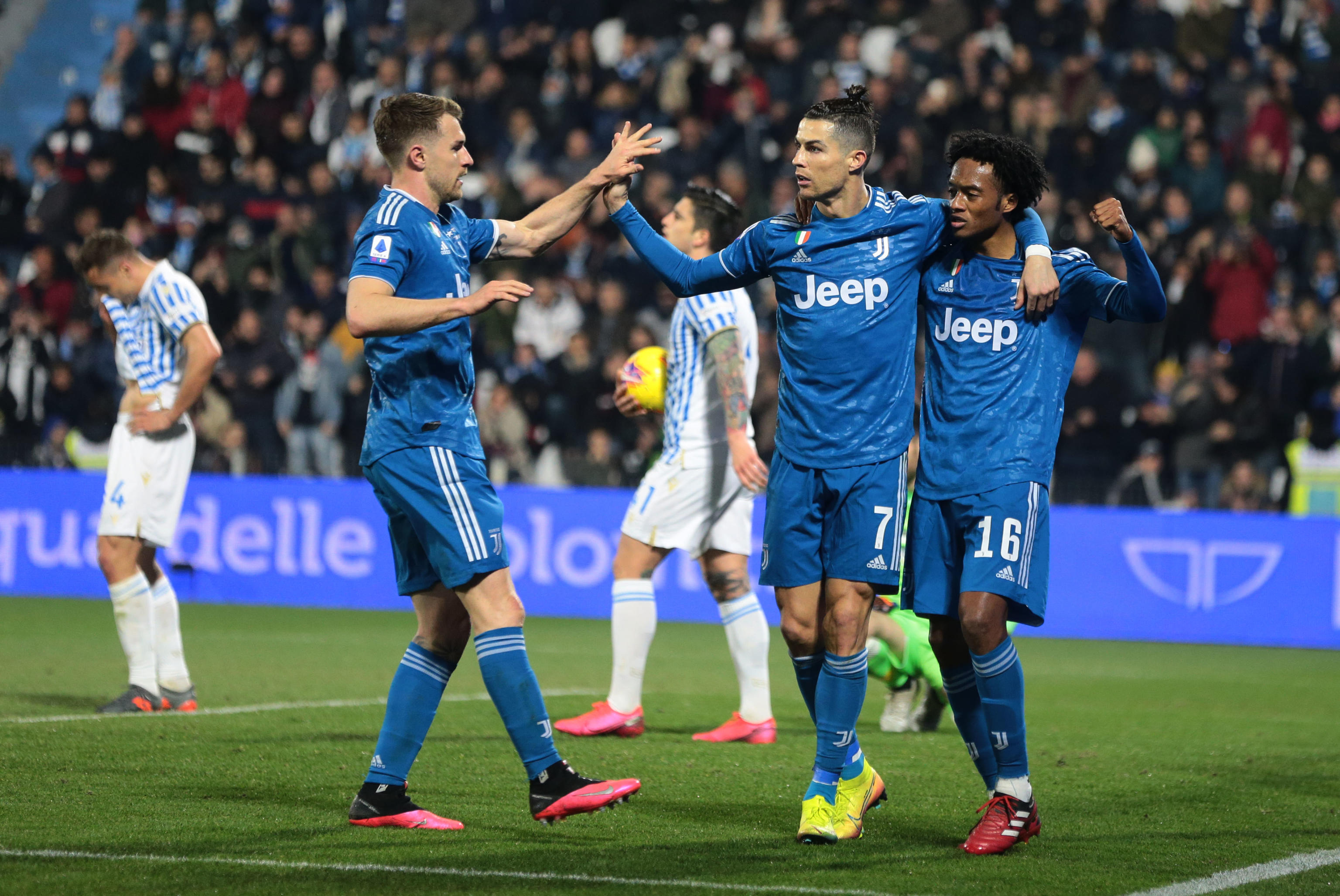 epa08238347 Juventus' Cristiano Ronaldo (C) celebrates scoring the opening goal during the Italian Serie A soccer match S.P.A.L vs Juventus FC at Paolo Mazza stadium in Ferrara, Italy, 22 February 2020.  EPA-EFE/ELISABETTA BARACCHI