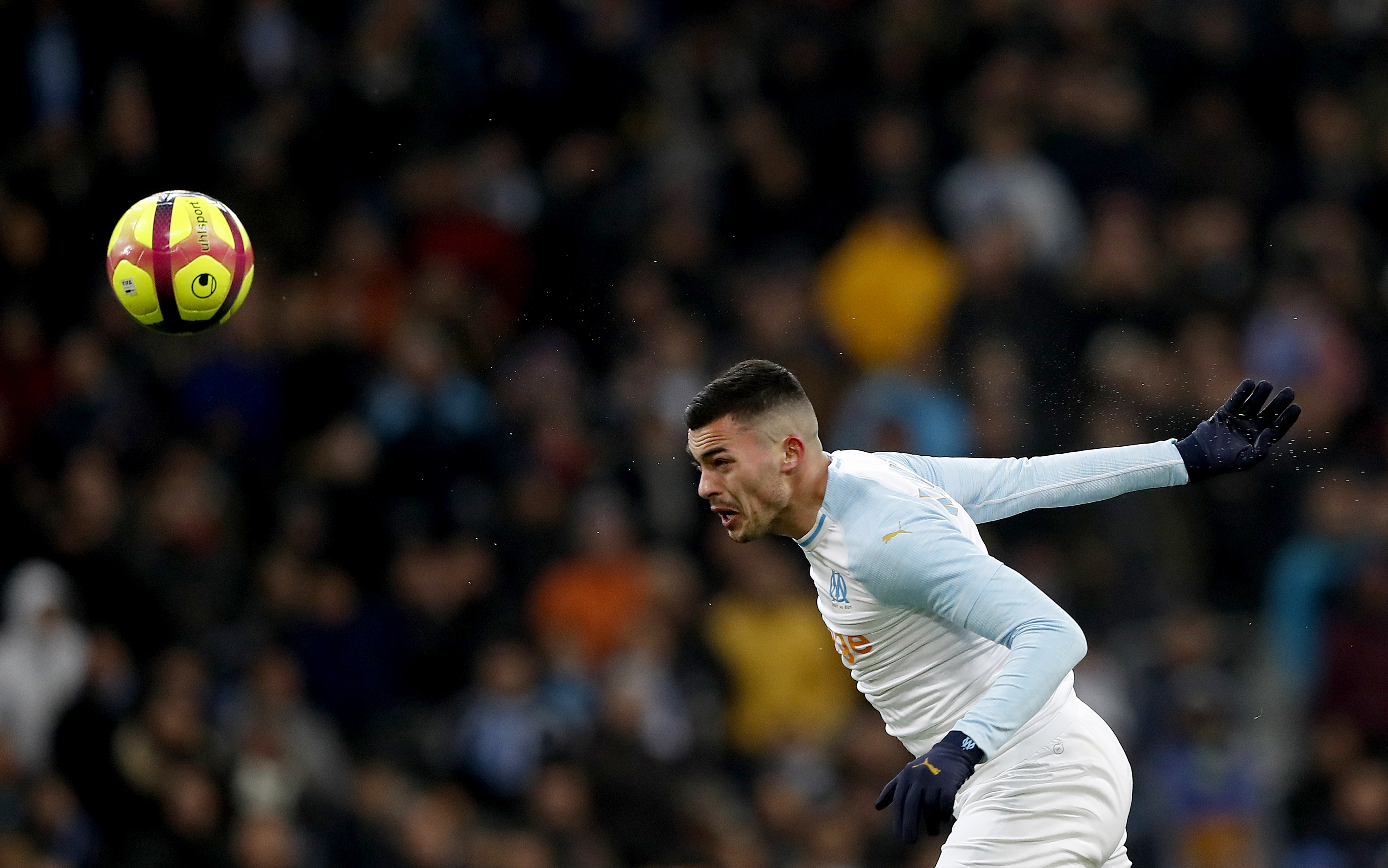 epa07319639 Nemanja Radonjic of Olympique Marseille in action during the French Ligue 1 soccer match between Olympique Marseille and Lille OSC at the Velodrome Stadium in Marseille, southern France, 25 January 2019.  EPA-EFE/GUILLAUME HORCAJUELO