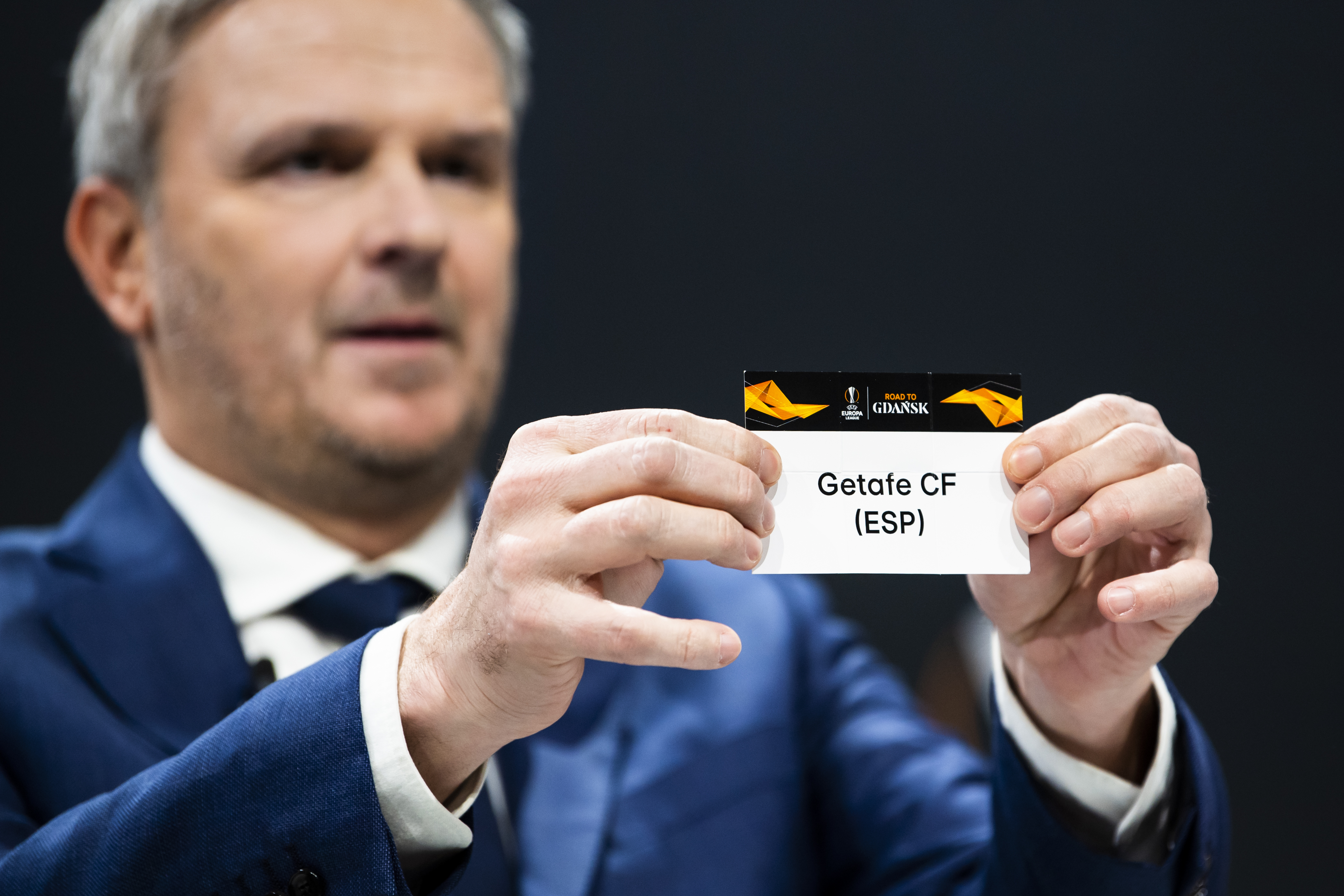 epa08255395 German former soccer player Dietmar Hamann shows a ticket of Getafe CF during the UEFA Europa League 2019/20 Round of 16 draw, at the UEFA Headquarters in Nyon, Switzerland, 28 February 2020.  EPA-EFE/JEAN-CHRISTOPHE BOTT