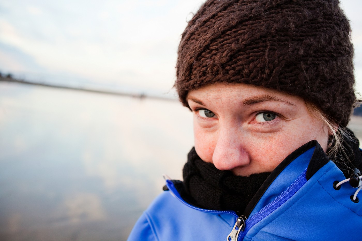 Woman on beach in winter