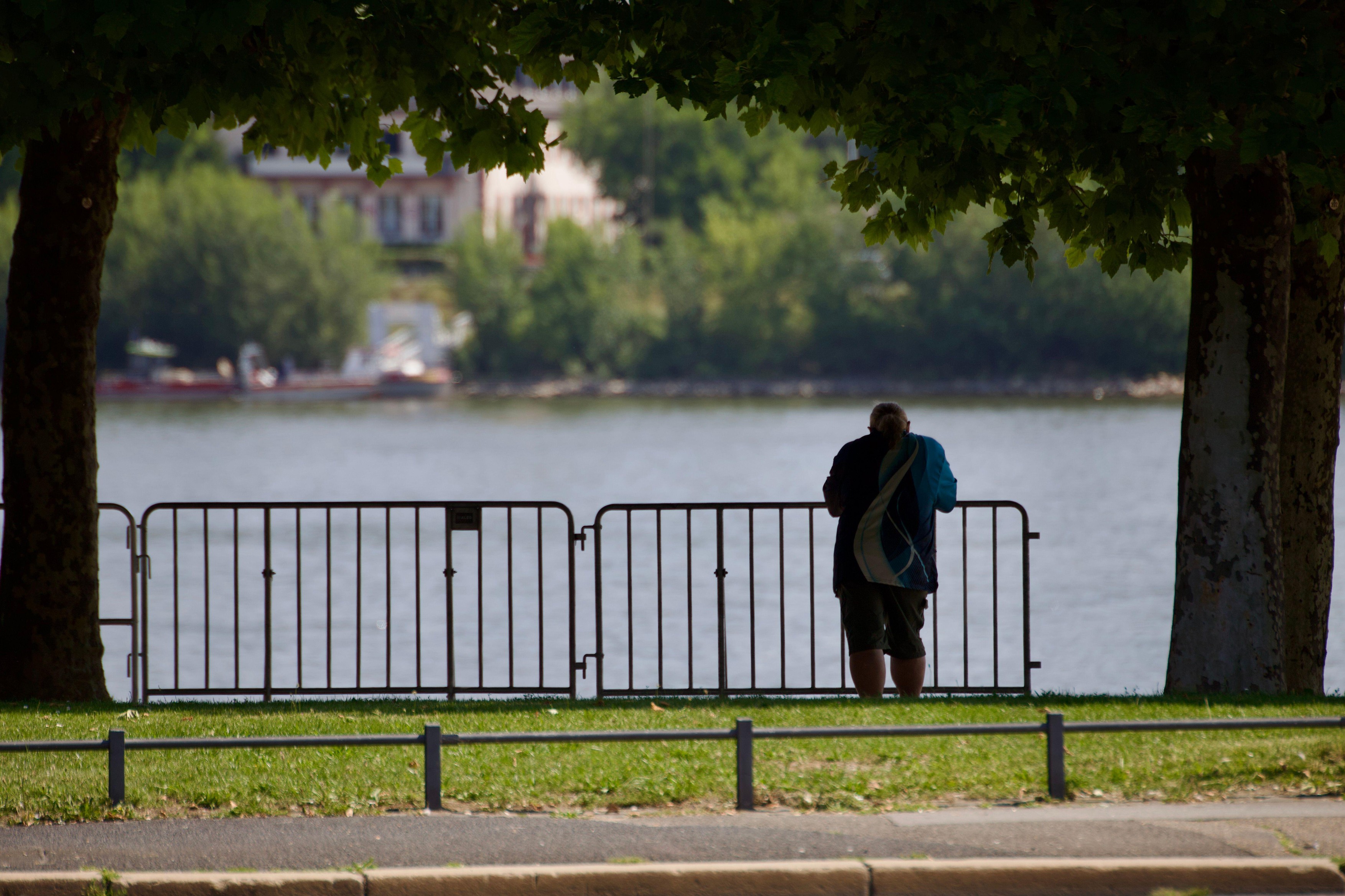 Mainz, Western Germany. June 14, 2025. A man by the Rhein river.