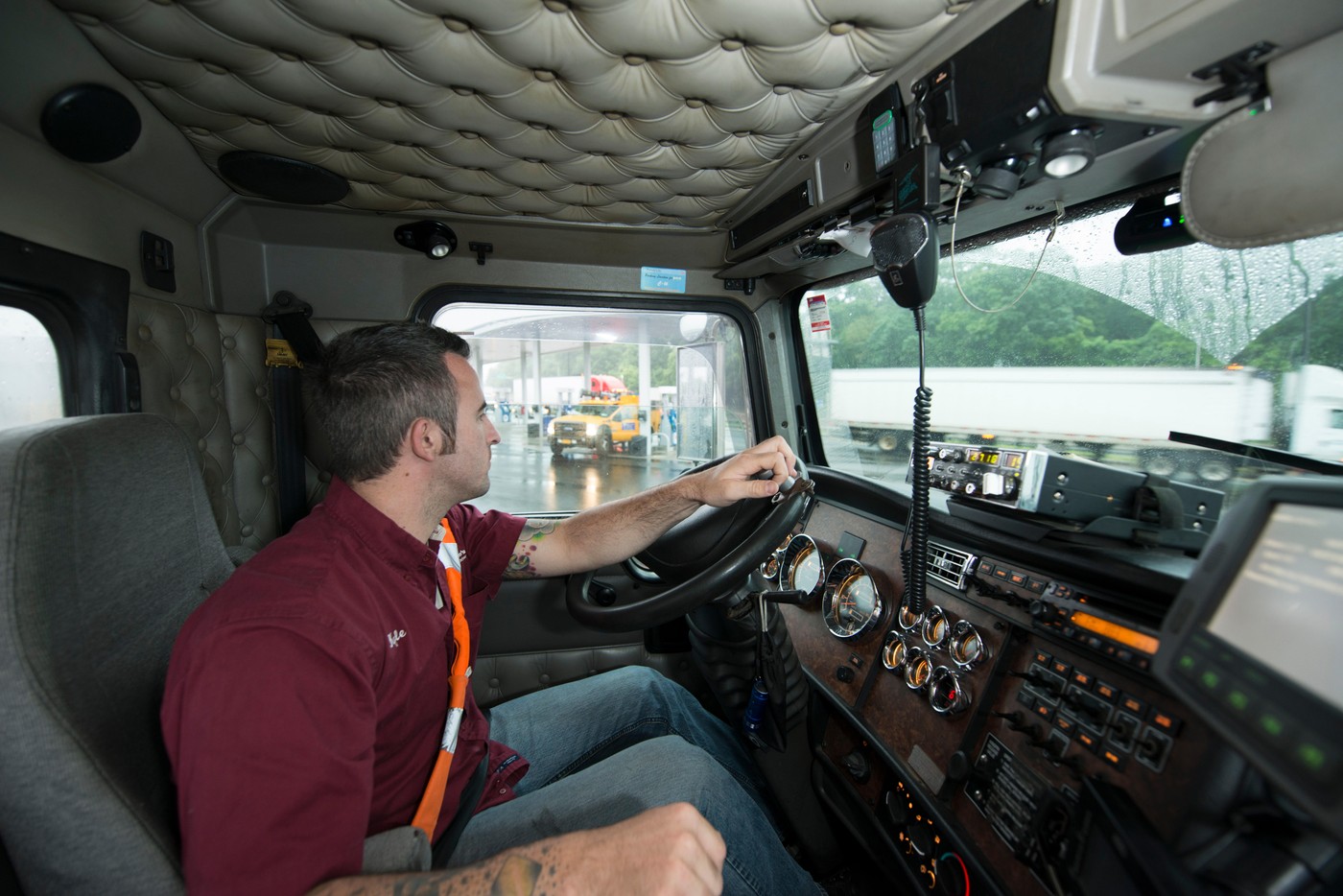 Trucking distribution.  Kyle Chapman, driver for Bozzuto's, the largest distributor of food in Connecticut, at rest area.