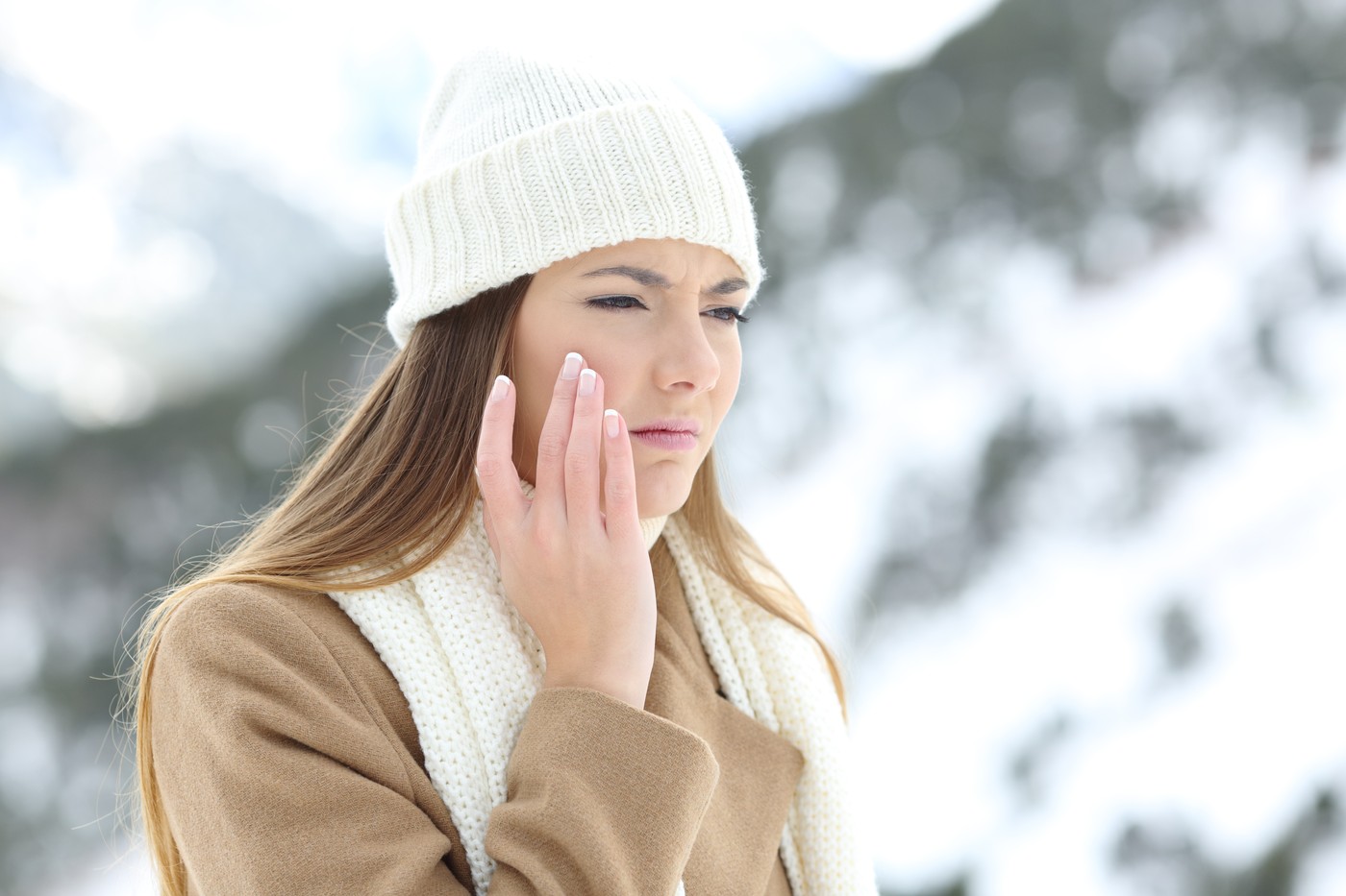 Angry woman using a sking protection moisturizer cream in winter in a snowy mountain,Image: 528517551, License: Royalty-free, Restrictions: , Model Release: yes, Credit line: Antonio Guillen Fernández / Panthermedia / Profimedia