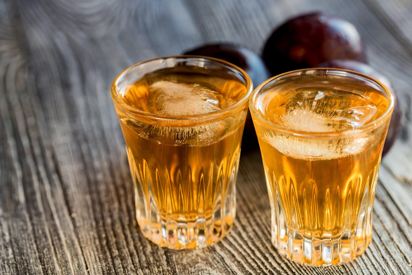 Plum liqueur or slivovitz, plum rakia with fresh and tasty plum on rustic wooden background,Image: 358837538, License: Royalty-free, Restrictions: , Model Release: no, Credit line: Yakov Oskanov / Alamy / Profimedia