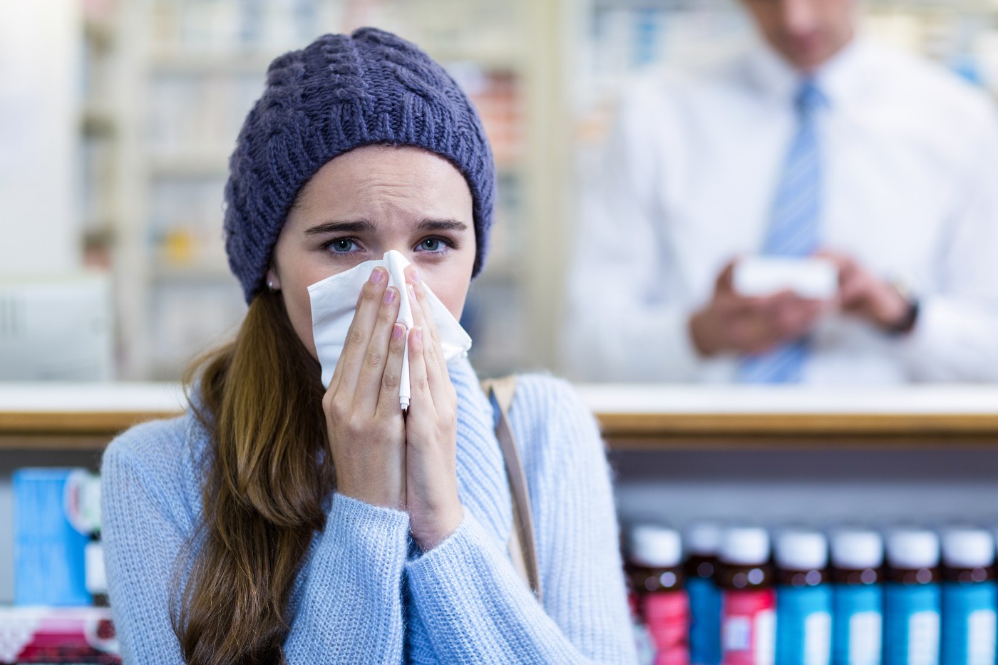 Portrait of customer covering her nose while sneezing in pharmacy,Image: 309191599, License: Rights-managed, Restrictions: , Model Release: yes, Credit line: Wavebreak Media LTD / Wavebreak / Profimedia