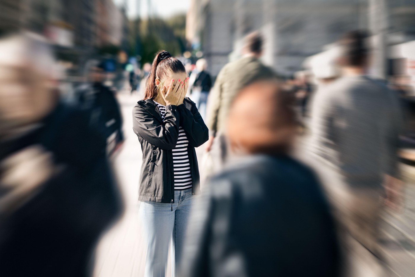 Fear, panic or anxiety of a depressed woman. Schizophrenia or stress attack. Crowd of people in street. Mental health trauma. Phobia, paranoia or agor