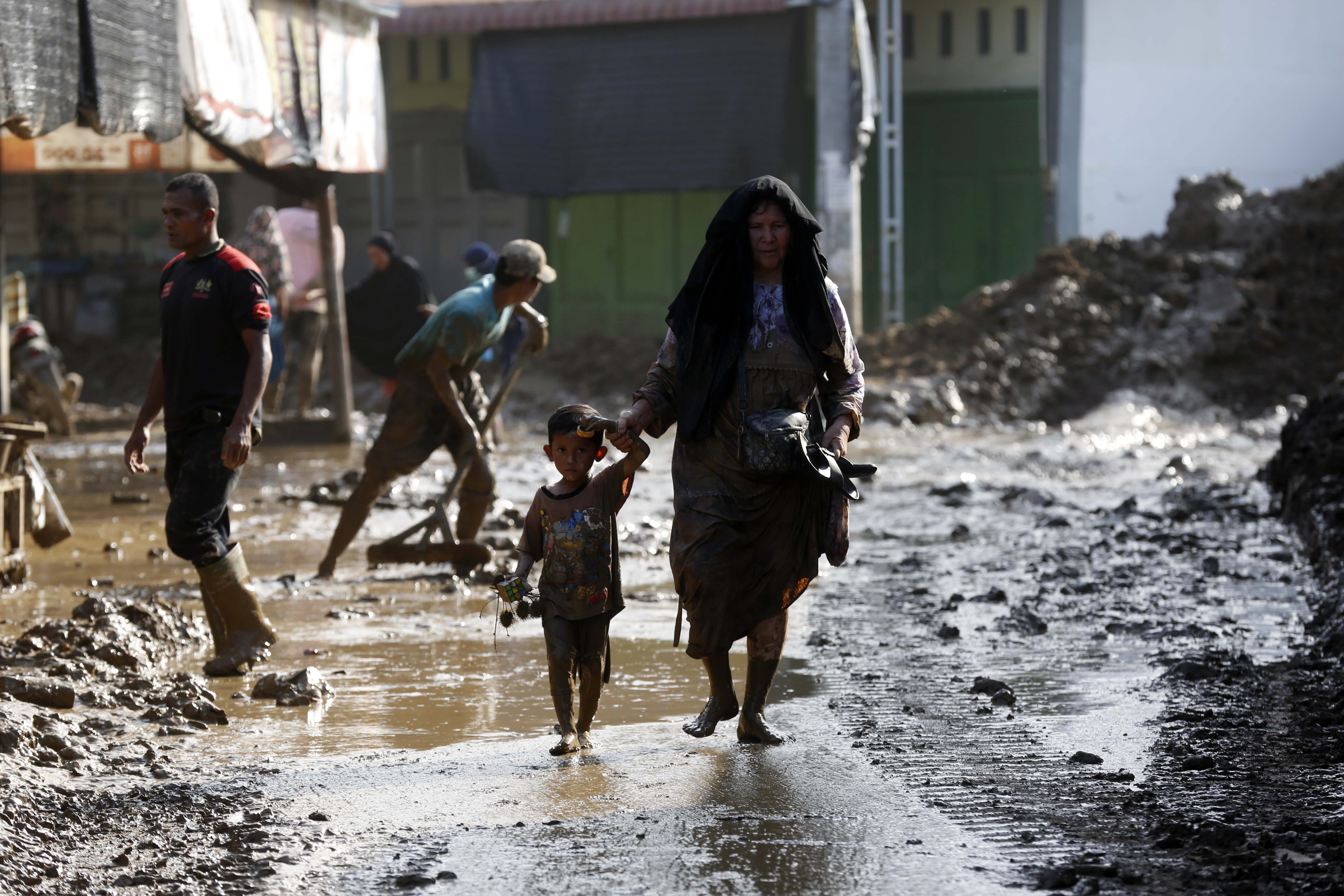 Aftermath of floods and landslides that killed hundreds of people in Sumatra