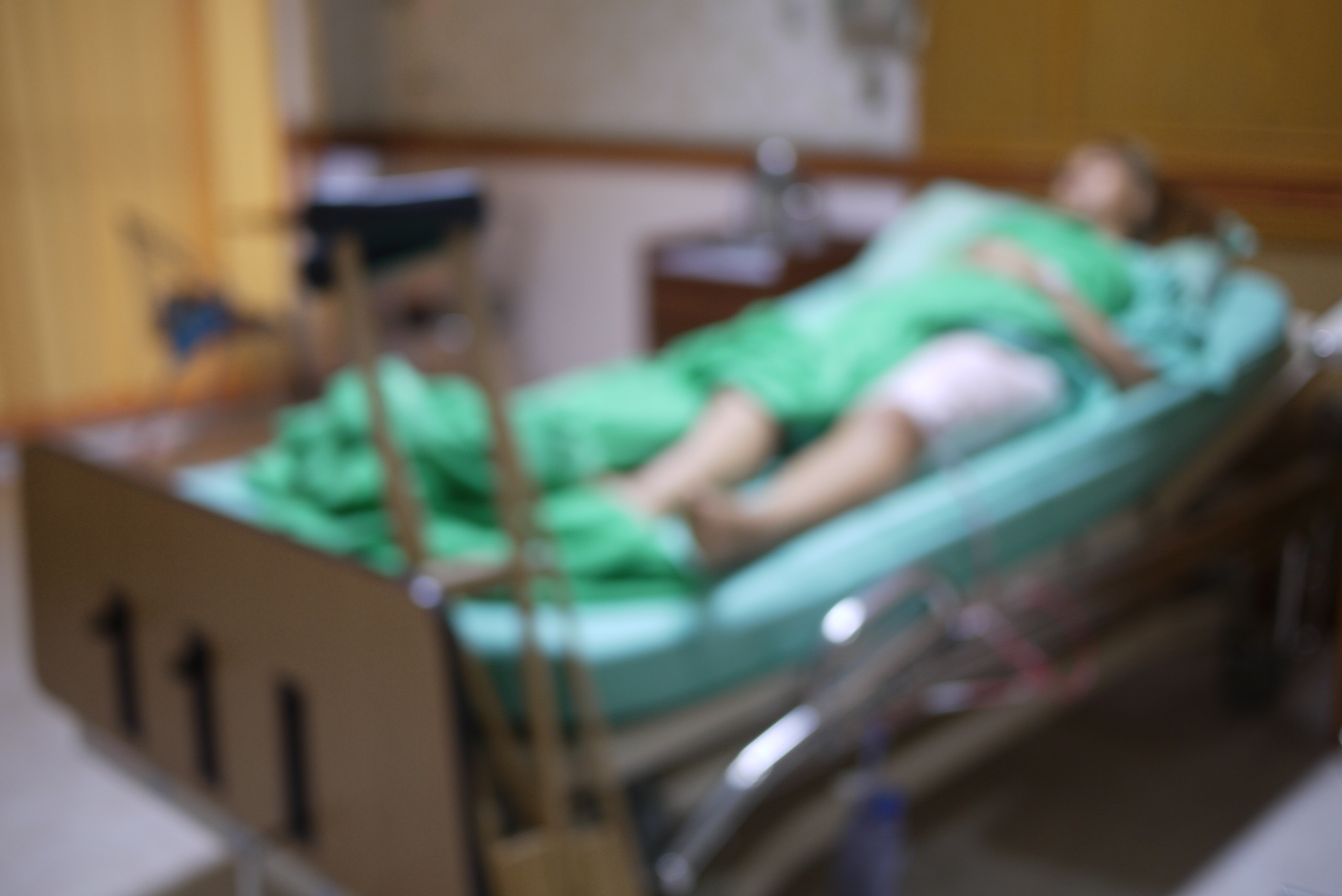 Blurred,Image,Of,Crutches,With,Patients,Broken,Leg,Lying,On