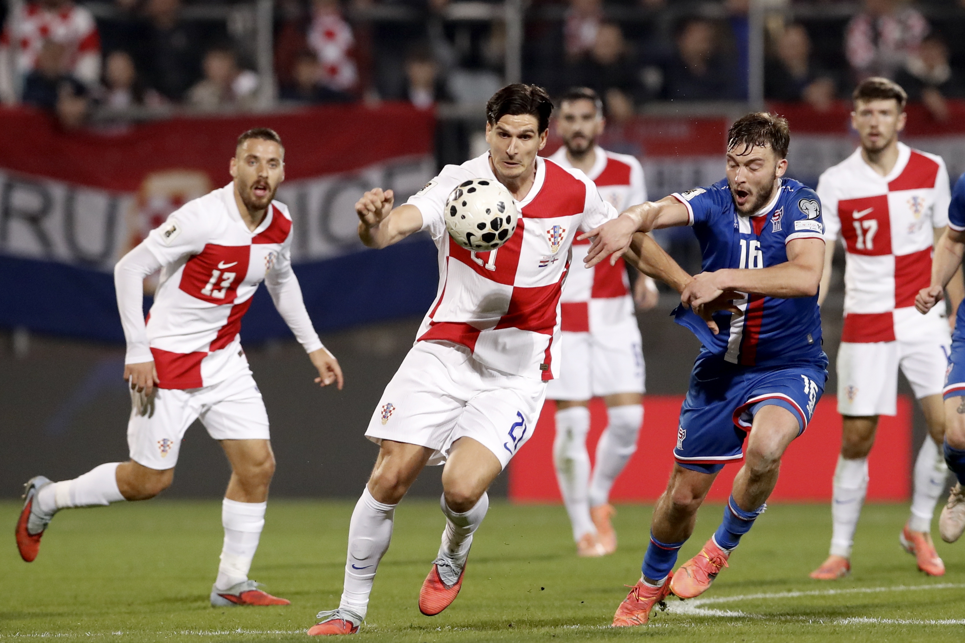 epa12527127 Croatia's Igor Matanovic (L) in action against Faroe Islands' Gunnar Vatnhamar (R) during the FIFA World Cup 26 UEFA qualifier between Croatia and Faroe Islands in Rijeka, Croatia, 14 November 2025.  EPA/ANTONIO BAT
