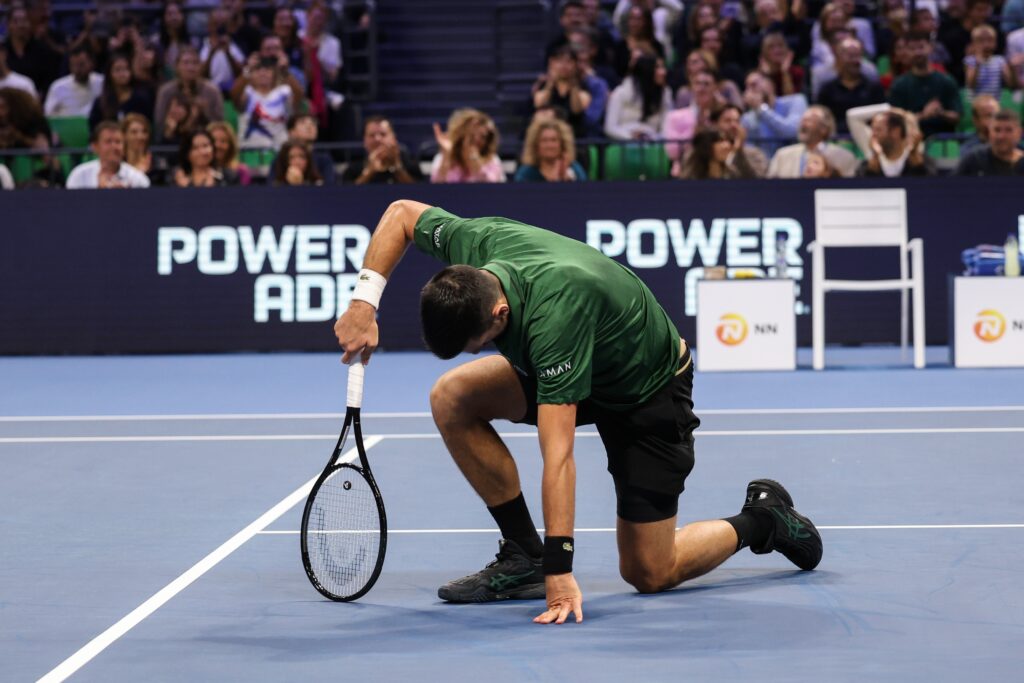 epa12512726 Novak Djokovic of Serbia in action against  Lorenzo Musetti of Italy (not pictured) during the men's finals match of the ATP Hellenic Championship tennis tournament, Athens, Greece, 08 November 2025.  EPA/GEORGE VITSARAS