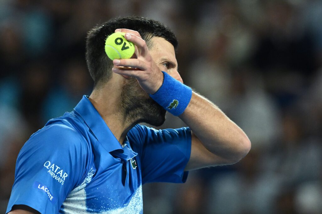 epa11841666 Novak Djokovic of Serbia reacts during his Men's Singles quarterfinal match against Carlos Alcaraz of Spain at the Australian Open tennis tournament in Melbourne, Australia, 21 January 2025.  EPA-EFE/JOEL CARRETT  AUSTRALIA AND NEW ZEALAND OUT