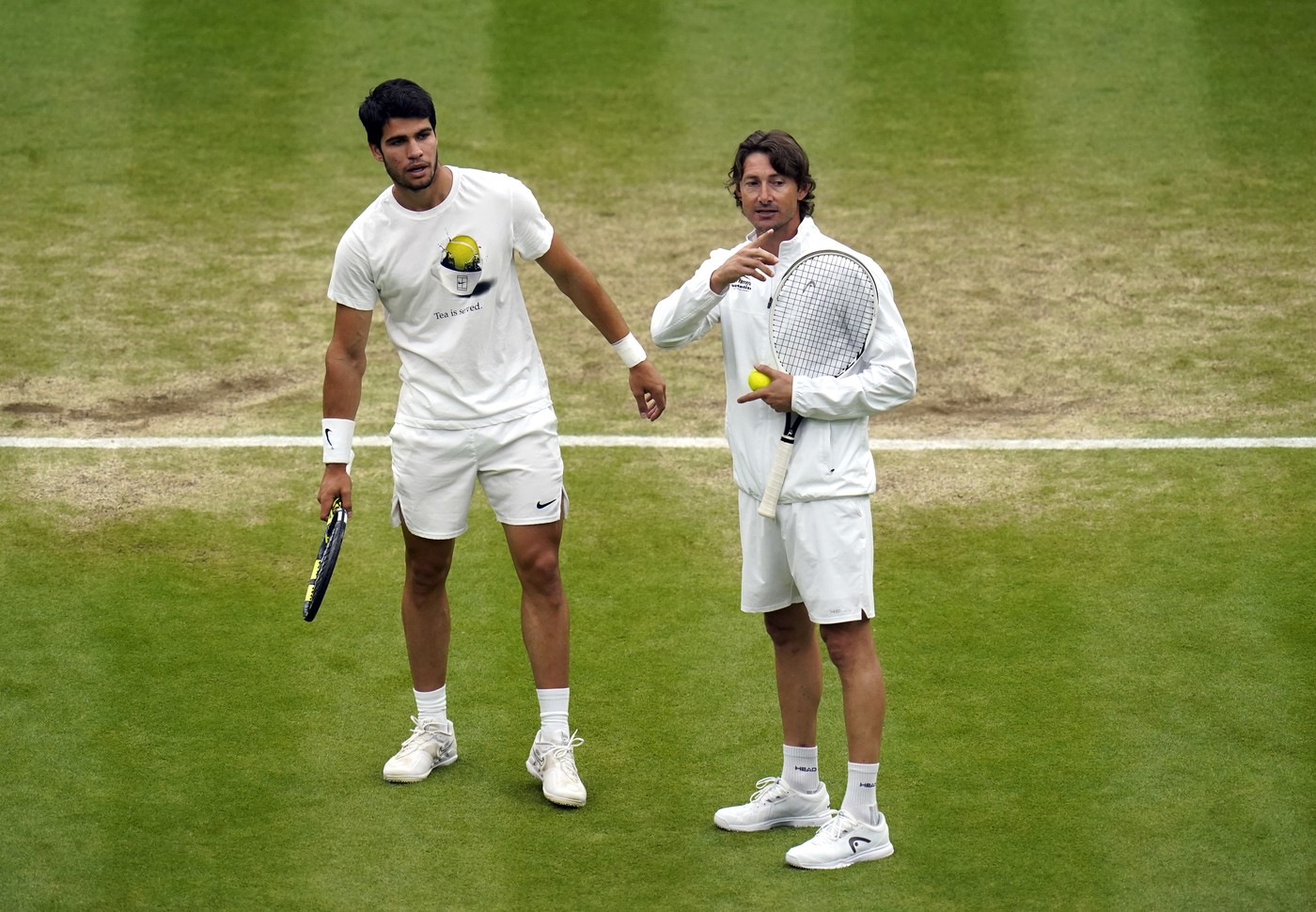 Carlos Alcaraz and Carlos Ferrero File Photo
