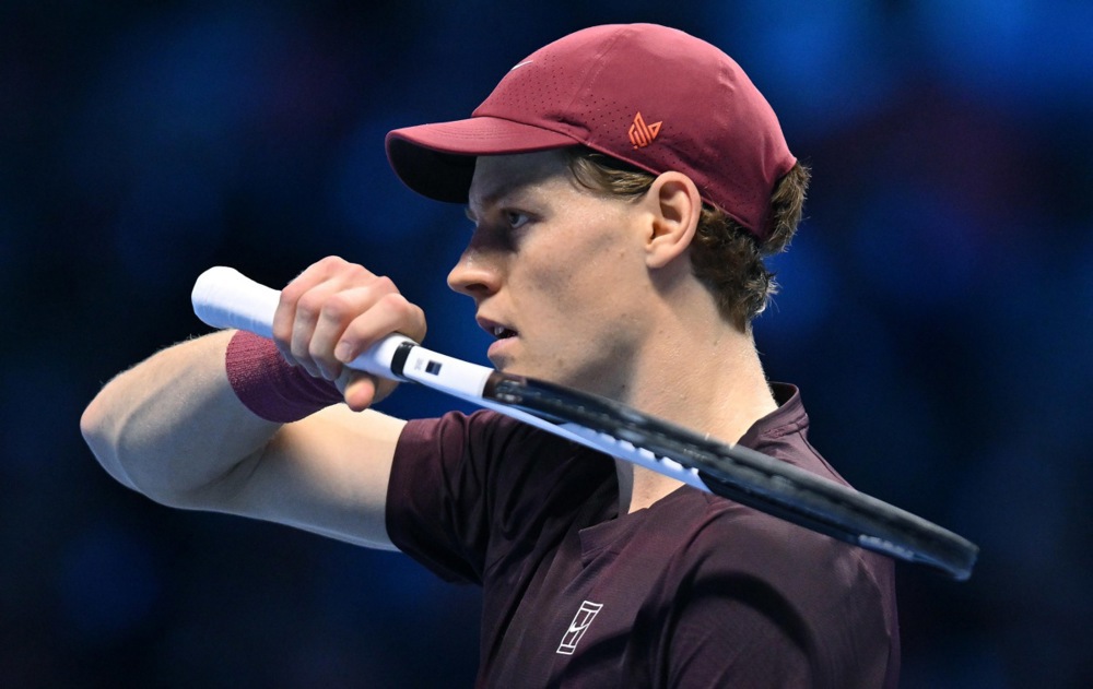 epa12530032 Jannik Sinner of Italy in action during the men's singles final match against Carlos Alcaraz of Spain at the ATP Finals in Turin, Italy, 16 November 2025.  EPA/ALESSANDRO DI MARCO