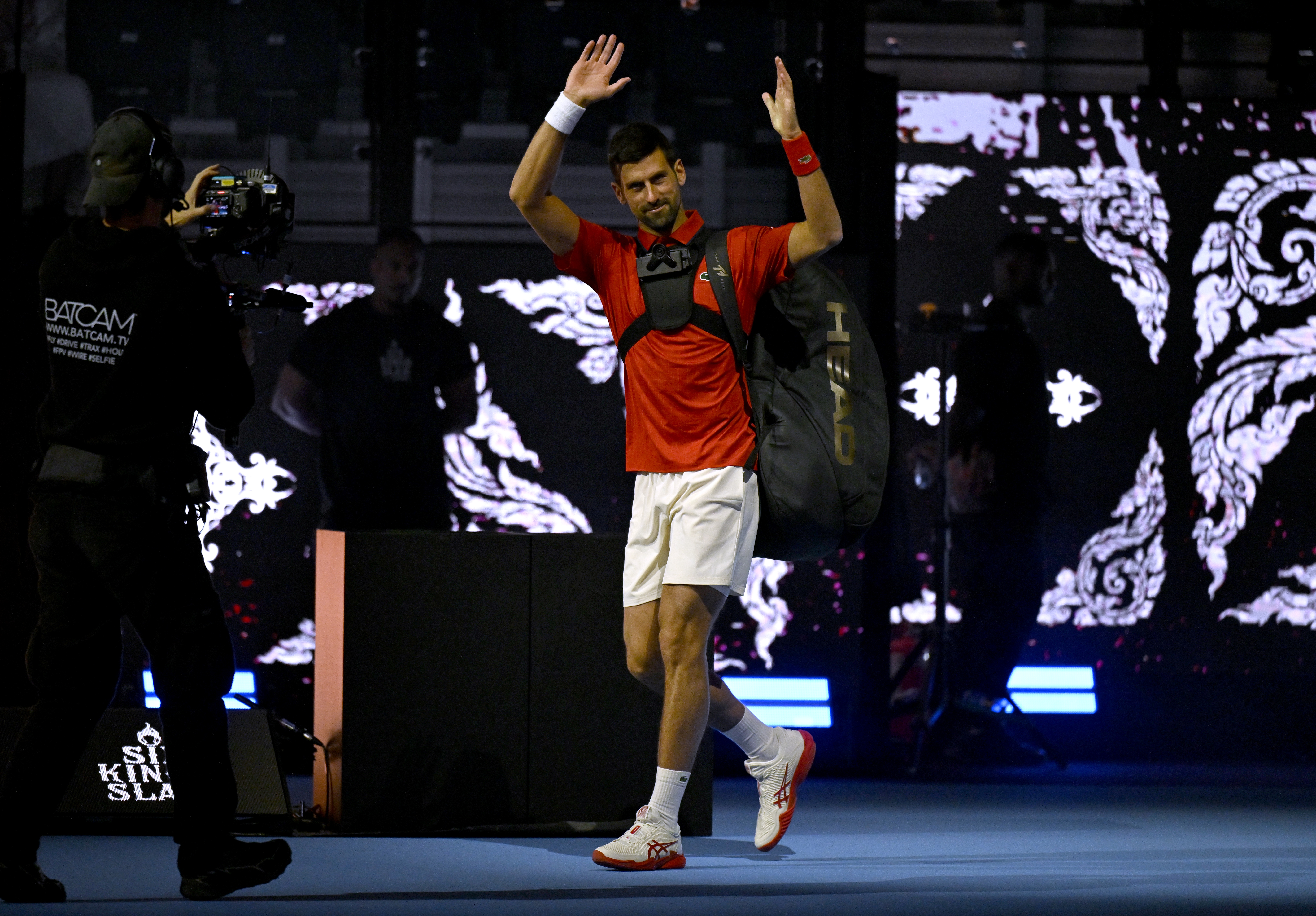 epa12458919 Novak Djokovic of Serbia enters the arena for his semifinal match against Jannik Sinner of Italy at the 2025 Six Kings Slam tennis tournament in Riyadh, Saudi Arabia, 16 October 2025. Sinner won in two sets.  EPA/STR
