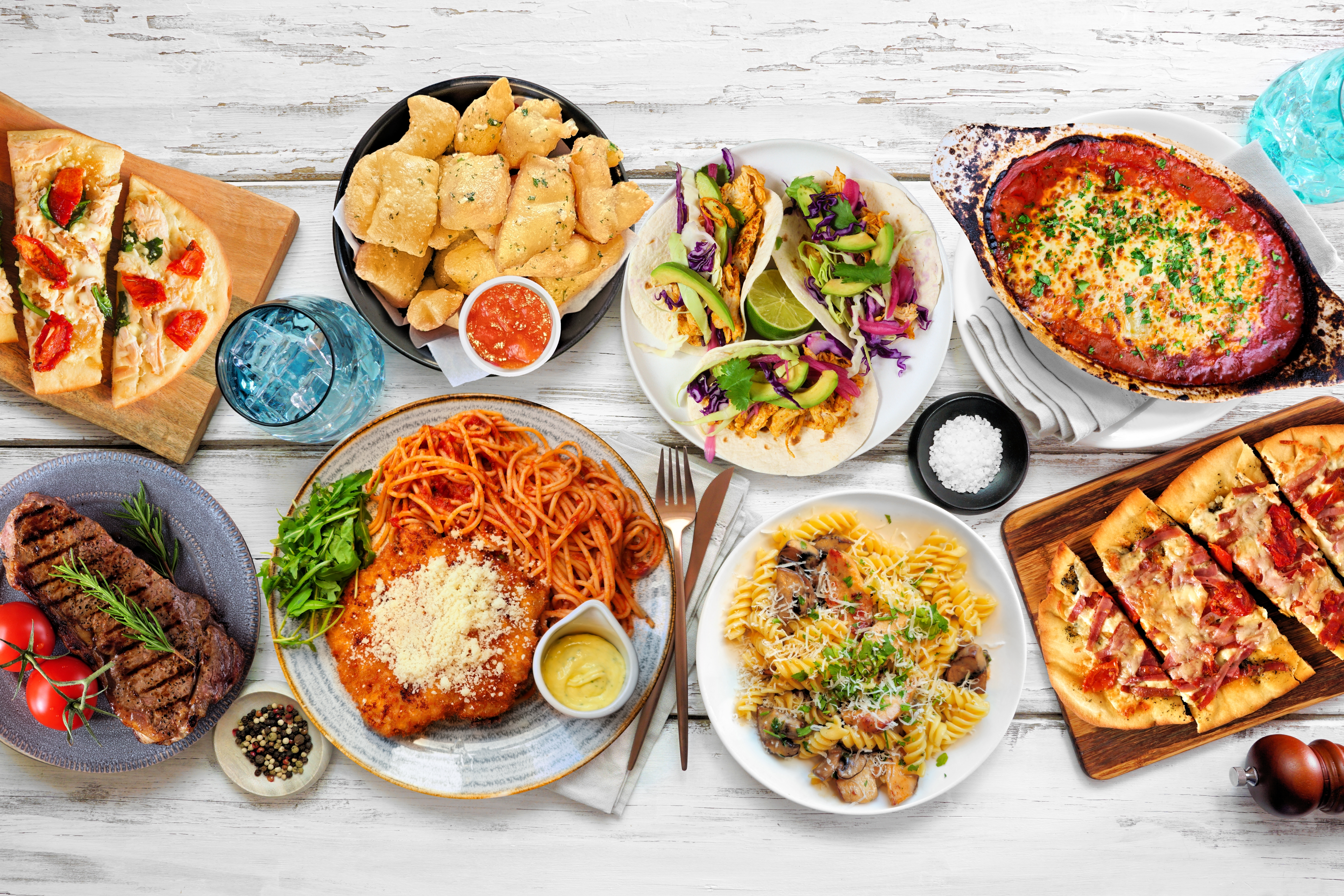 Table,Scene,Of,Various,Delicious,Foods.,Above,View,On,A