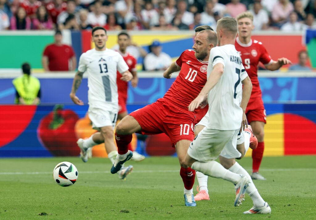 epa11415825 Christian Eriksen of Denmark (C) scores the 1-0 during the UEFA EURO 2024 Group C soccer match between Slovenia and Denmark, in Stuttgart, Germany, 16 June 2024.  EPA-EFE/RONALD WITTEK