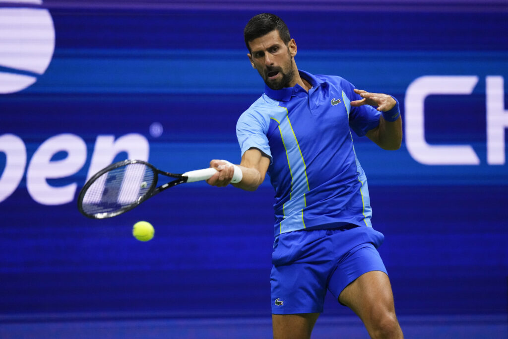 Novak Djokovic, of Serbia, returns a shot to Laslo Djere, of Serbia, during the third round of the U.S. Open tennis championships, Friday, Sept. 1, 2023, in New York. (AP Photo/Frank Franklin II)