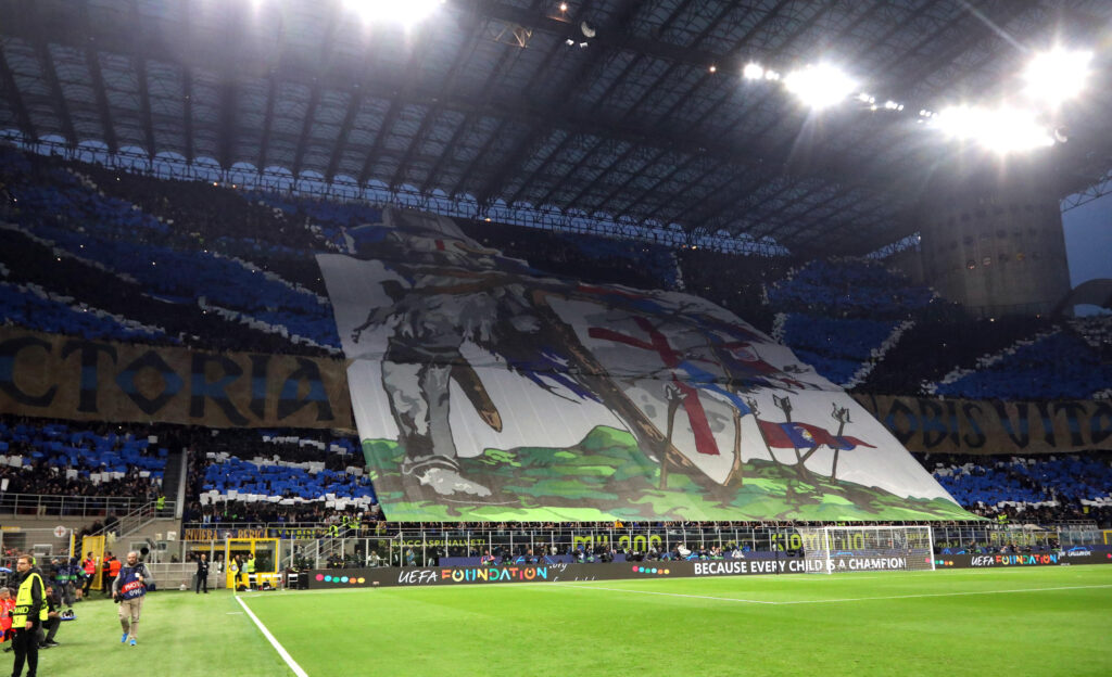 epa10632290 Supporters of FC Inter display a banner during the UEFA Champions League semi-final second leg soccer match between FC Inter and AC Milan, in Milan, Italy, 16 May 2023.  EPA-EFE/MATTEO BAZZI
