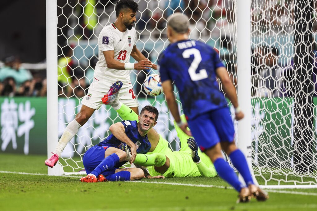 epa10337238 Christian Pulisic of USA reacts after scoring  the opening goal in the FIFA World Cup 2022 group B match between Iran and USA at Al Thumama Stadium in Al Thumama, Qatar, 29 November 2022.  EPA-EFE/JOSE SENA GOULAO