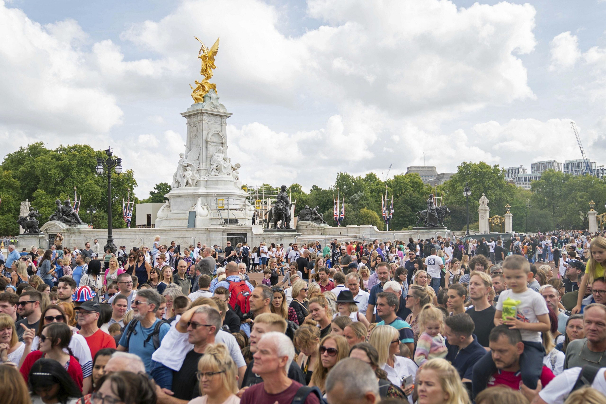 Well-wishers outside Buckingham Palace, London, following the death of Queen Elizabeth II, Sunday Sept. 11, 2022. (James Manning/PA via AP)