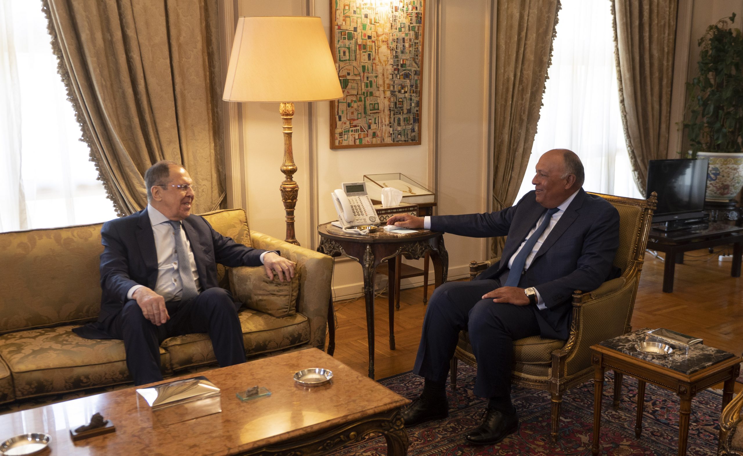 epa10089422 Russian Foreign Minister Sergei Lavrov (L) sits for a meeting with his Egyptian counterpart Sameh Shoukry (R), in Cairo, Egypt, 24 July 2022.  EPA-EFE/Mohamed Hossam