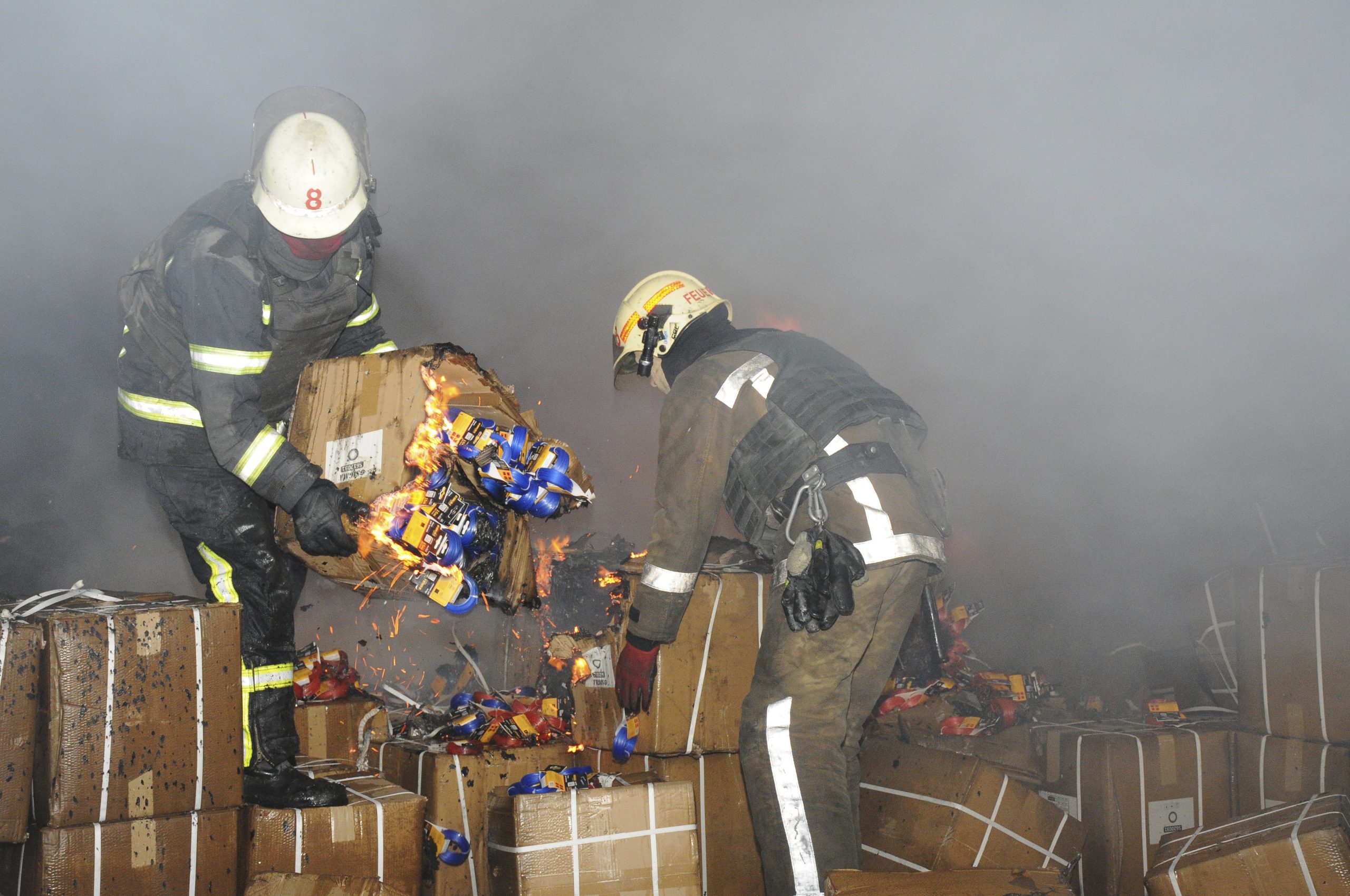 Firefighters work to extinguish a fire after shelling in Kharkiv, Ukraine, Wednesday, April 13, 2022. (AP Photo/Andrew Marienko)