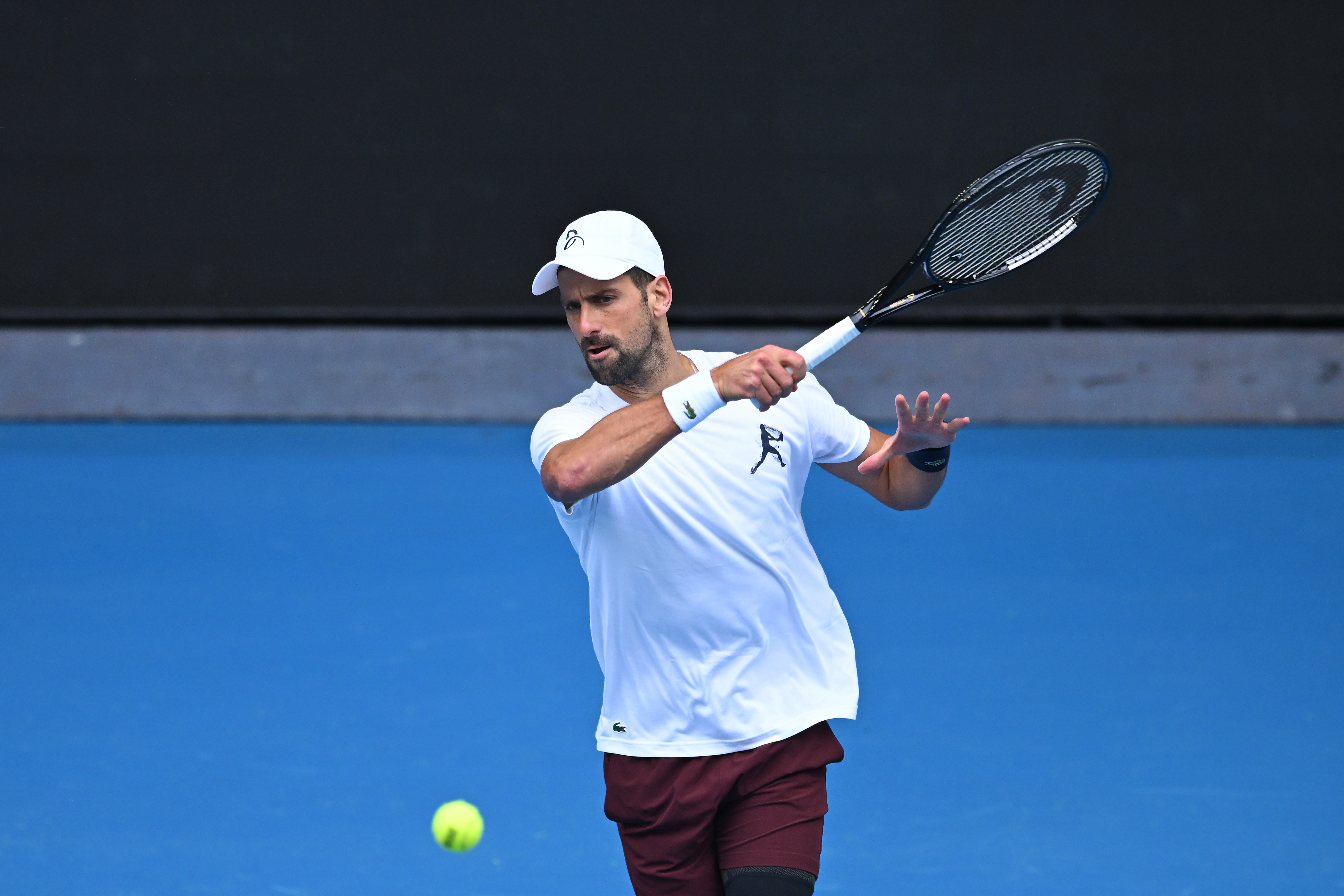 epa12645718 Novak Djokovic of Serbia practices ahead of the Australian Open tennis tournament at Melbourne Park in Melbourne, Australia, 13 January 2026.  EPA/JAMES ROSS AUSTRALIA AND NEW ZEALAND OUT
