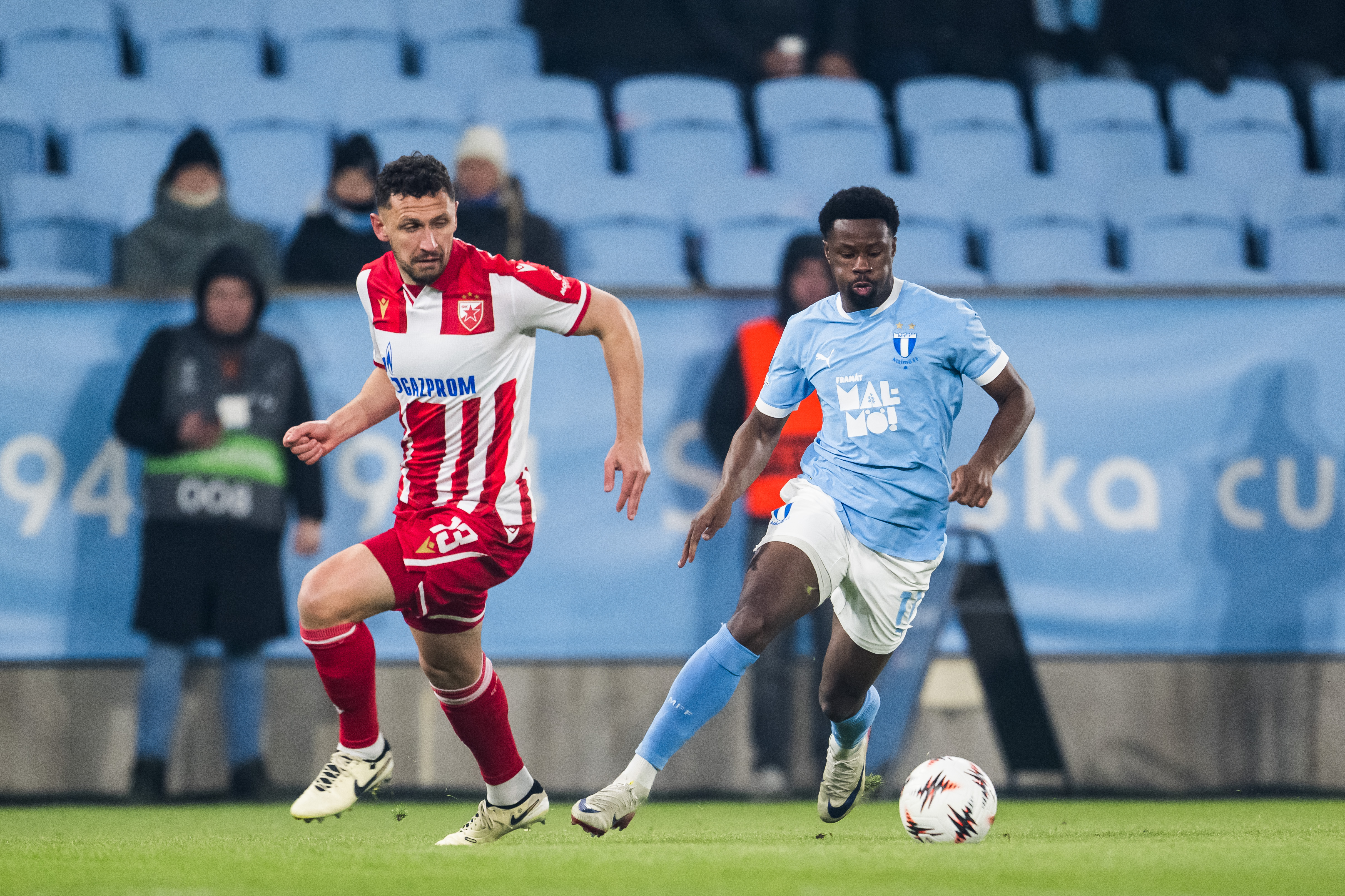 Emmanuel Ekong of Malmo and Milos Veljkovic (L) of Crvena Zvezda during the UEFA Europa League 2025/26 League Phase match between Malmo and FK Crvena Zvezda at Elado Stadium on January 22, 2026 in Malmo, Sweden.  (Photo by Petter Arvidson/Starsport.rs ©)