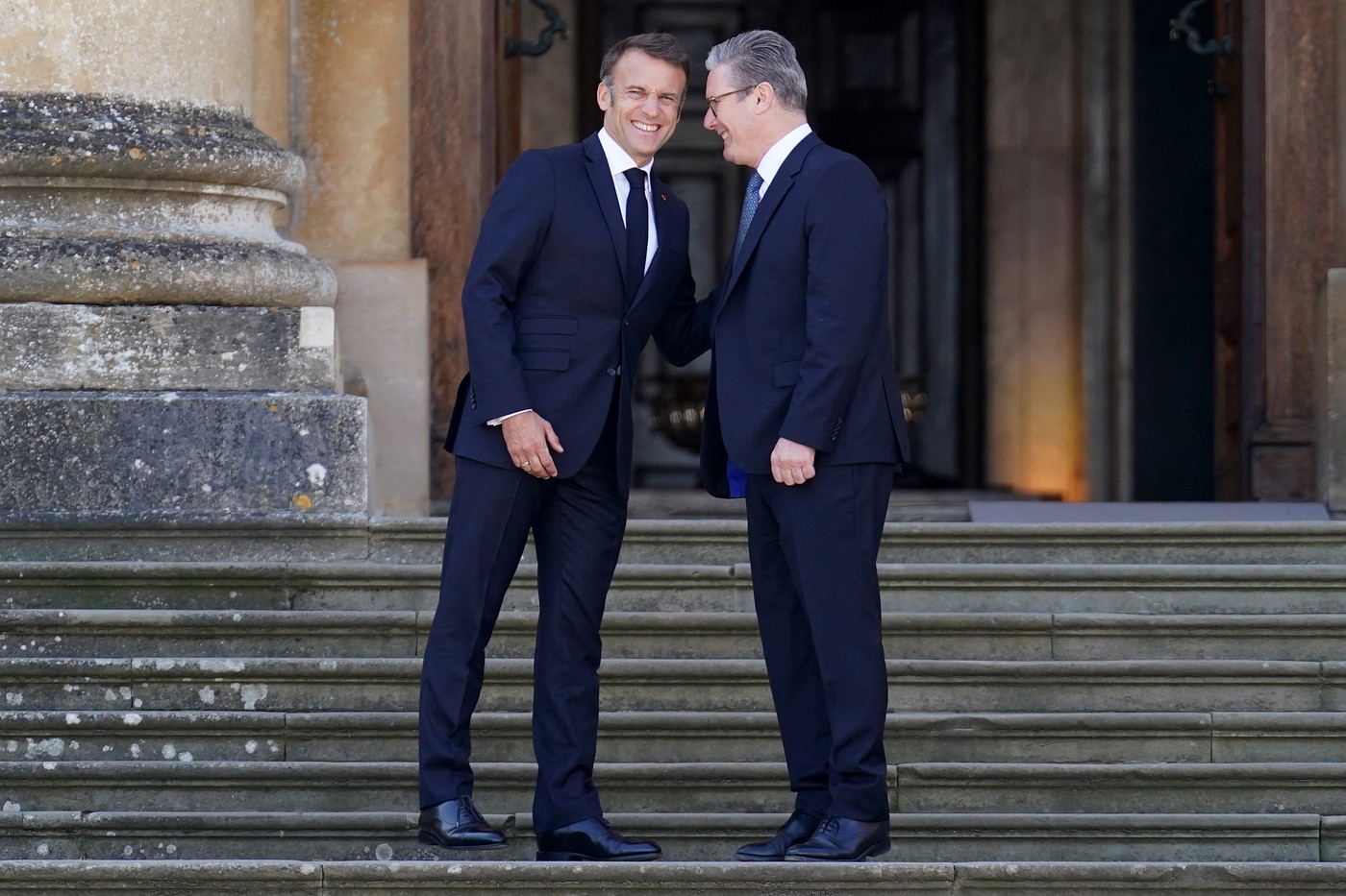 France's President Emmanuel Macron is greeted by Britain's Prime Minister Keir Starmer