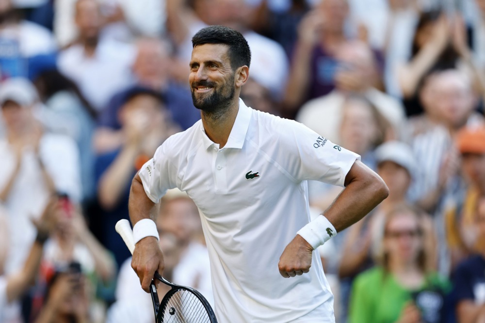 epa12227756 Novak Djokovic of Serbia celebrates winning his Men's Singles quarter-finals match against Flavio Cobolli of Italy at the Wimbledon Championships, Wimbledon, Britain, 09 July 2025.  EPA/TOLGA AKMEN  EDITORIAL USE ONLY