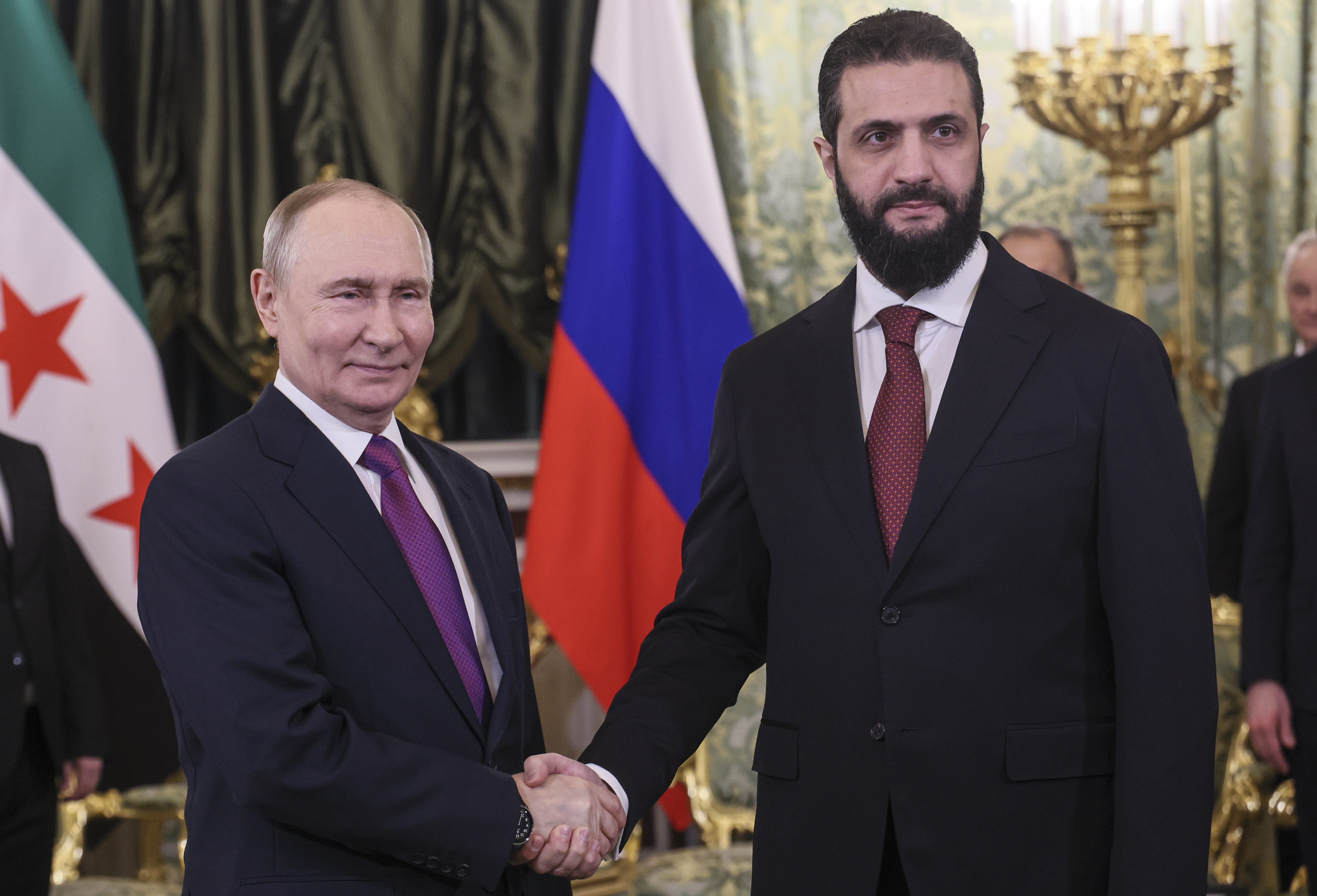 13686269.jpg Vladimir Putin arrives for his meeting with Syrian President Ahmed al-Sharaa