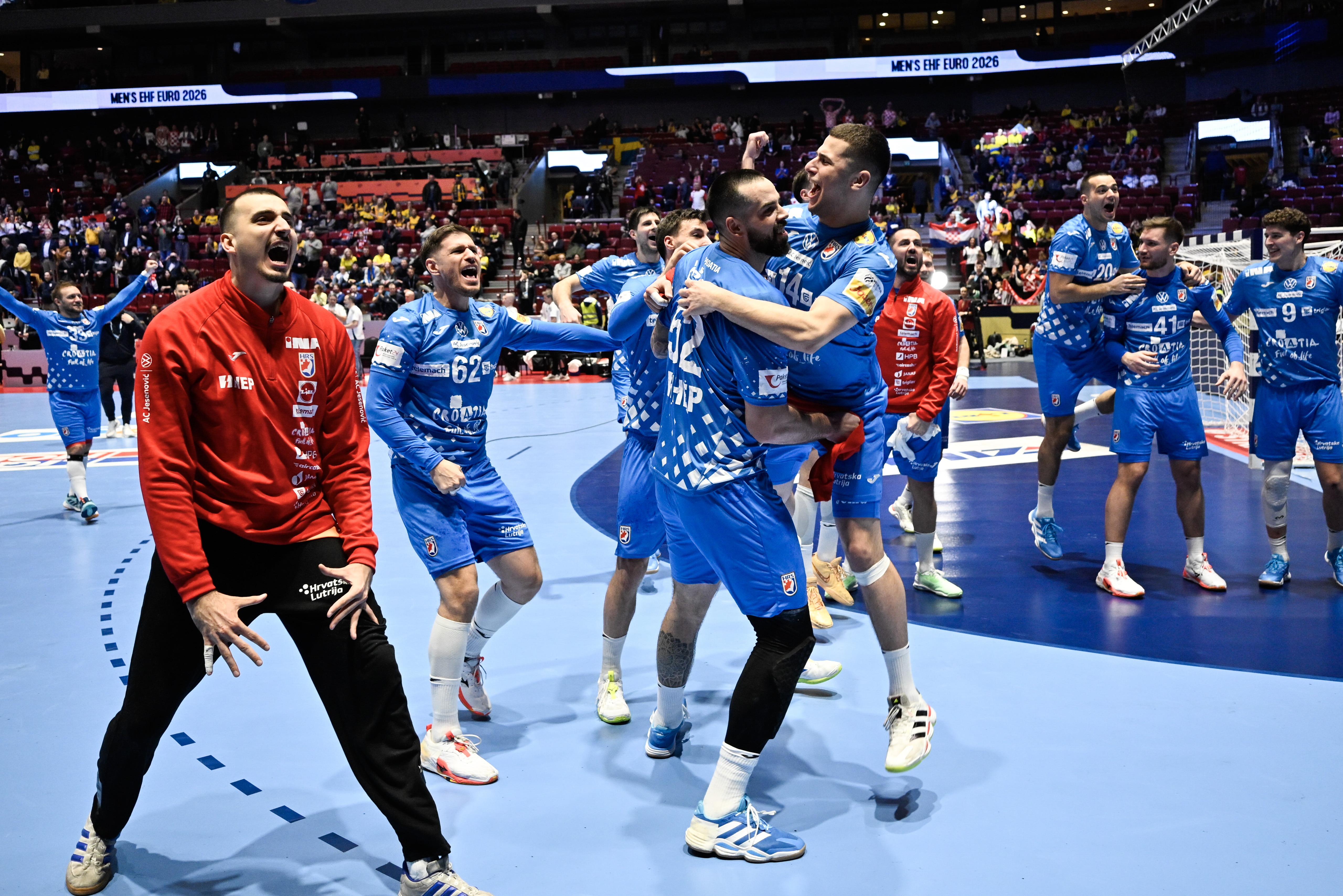 Croatia's team celebrates after winning the EHF EURO 2026 main round match against Hungary at the Malmo Arena, Sweden