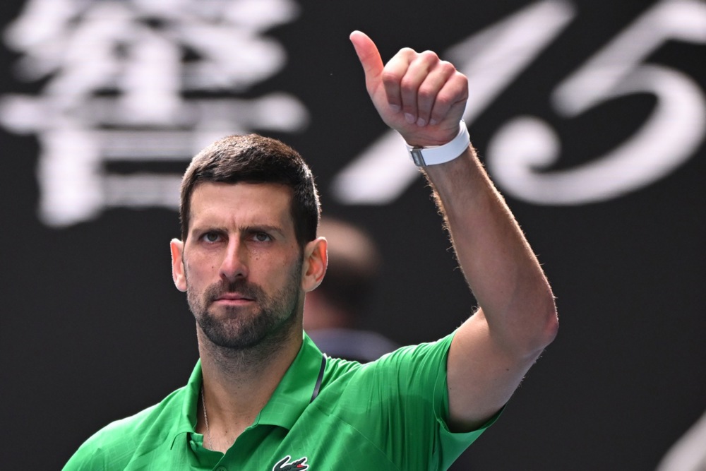 epa12686663 Novak Djokovic of Serbia gestures after Lorenzo Musetti of Italy retires