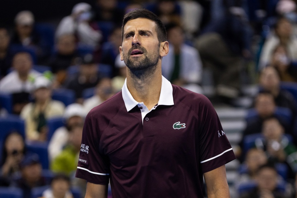 epa13272622 Novak Djokovic of Serbia reacts during his Men's Singles match